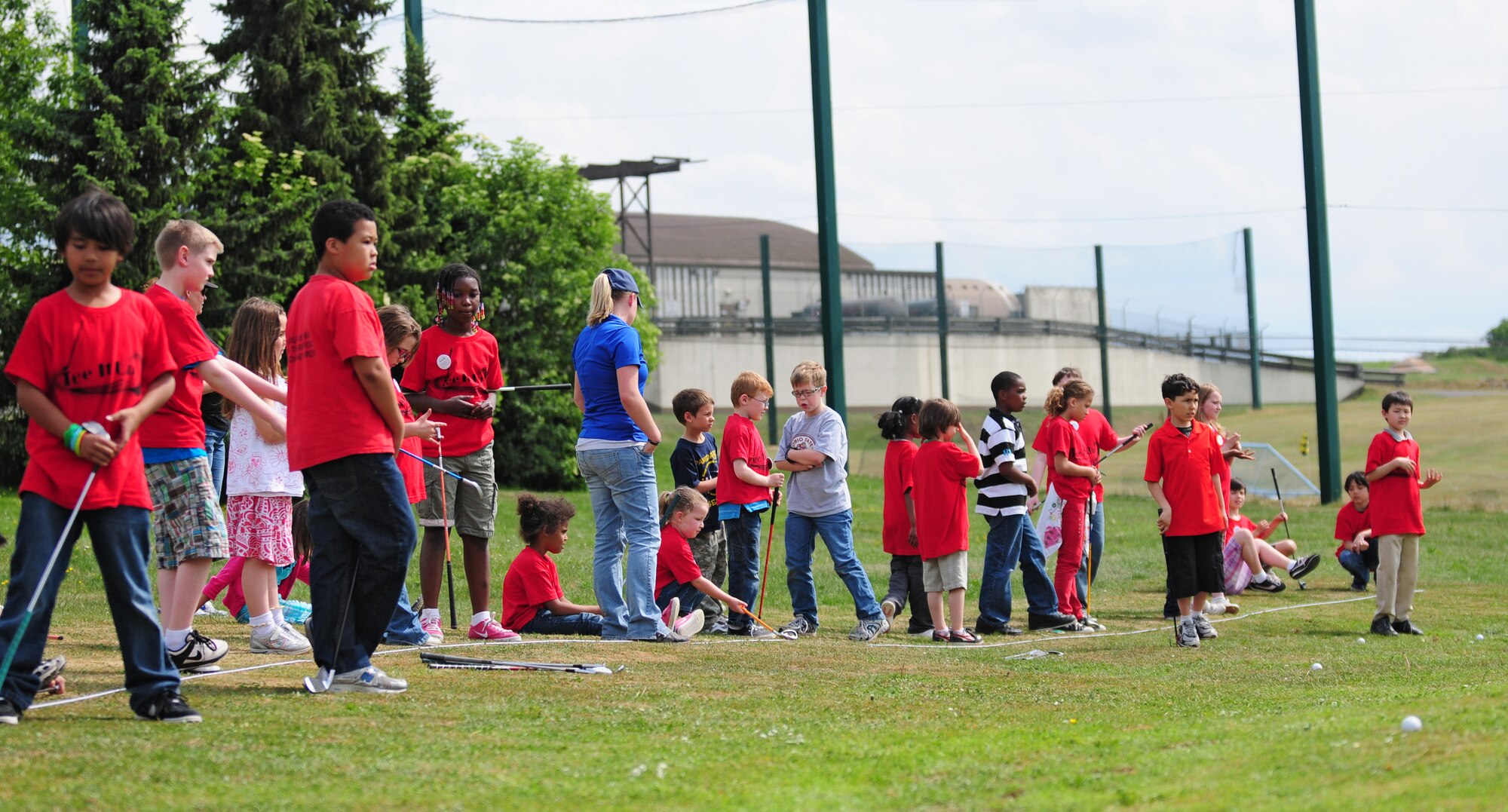 Children from the Spangdahlem and Bitburg elementary and middle schools participate in the youth golf clinic at the Eifel Mountain Golf Course here May 20. The clinic was taught by Tee it Up Inc. and sponsored by the 52nd Force Support Squadron to teach the youth how to play the game. (U.S. Air Force photo/Airman 1st Class Matthew Fredericks)
