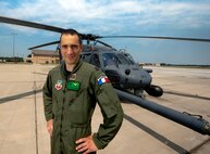 MOODY AIR FORCE BASE, Ga.-- Capitaine (Capt.) Sebastian Alvarez, 41st Rescue Squadron HH-60G Pave Hawk pilot, originally flew the Aérospatiale SA 330J Puma which is very similar to the HH-60. Through a three-year officer exchange program, Captain Alvarez has become one of Moody’s newest pilots. (U.S. Air Force photo/Airman 1st Class Joshua Green)(RELEASED)
