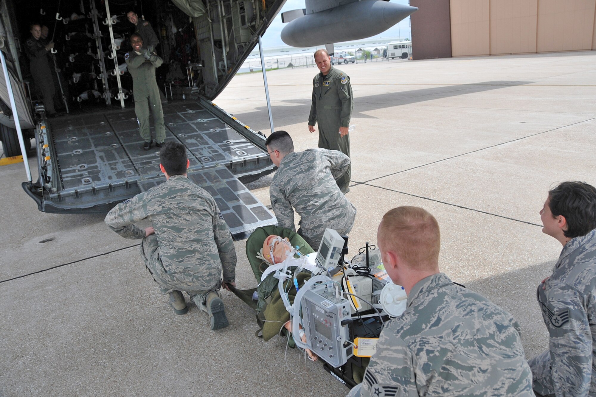OFFUTT AIR FORCE BASE, Neb. --Capt Gwendolyn Walker of the Aeromedical Evacuation crew who transport patients on AE missions under US TRANSCOM. Offutt Afb performed a national level exercise for 2011 on May 19 at the field house. Many participants were on hand for the NDMS Exercise, including many base agencies from Omaha simulating real life transporting of medical personel and victims acting out and responding giving medical care in case of a community emergency. U.S. Air Force Photo by Jeff W. Gates.