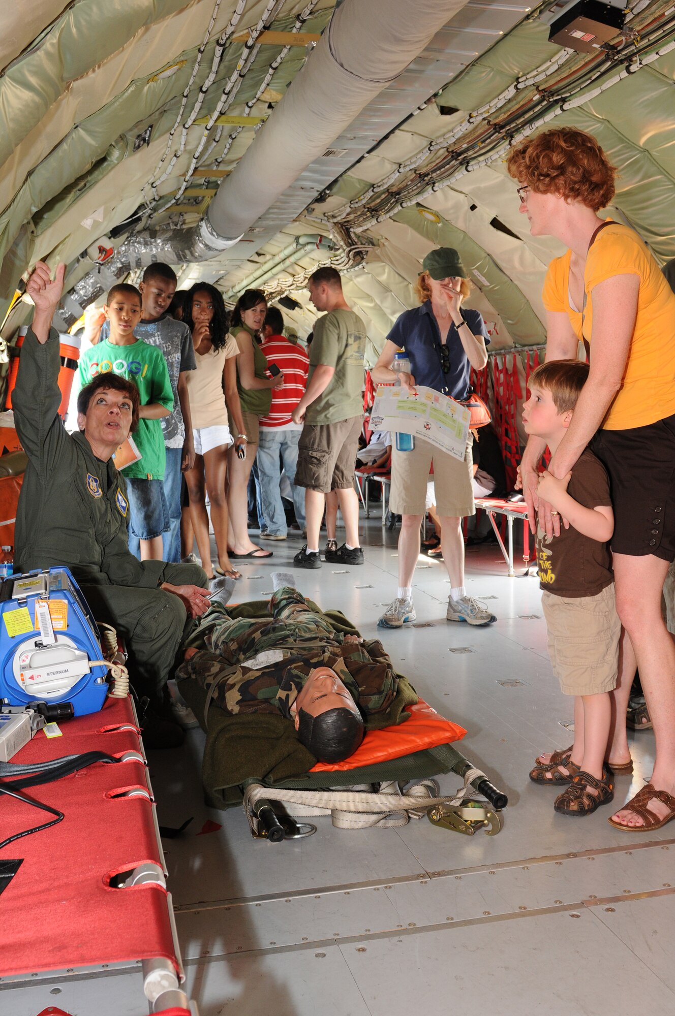 JOINT BASE ANDREWS, Md. -- Lt. Col. Elaine D-aprile, 459th Air Refueling Wing flight nurse, shares the Aeromedical Evacuation capabilities of a KC-135 Stratotanker at the Joint Service Open House here May 22, 2011. The JSOH affords the public an opportunity to meet the men and women of the Armed Forces and to see military equipment from the Navy, Marines, Army, Air Force and Coast Guard. The JSOH is planned and conducted through the efforts of active duty, guard and reserve service members, as well as civilian employees, retirees and family members. (U.S. photo/Tech. Sgt. Steve Lewis) 