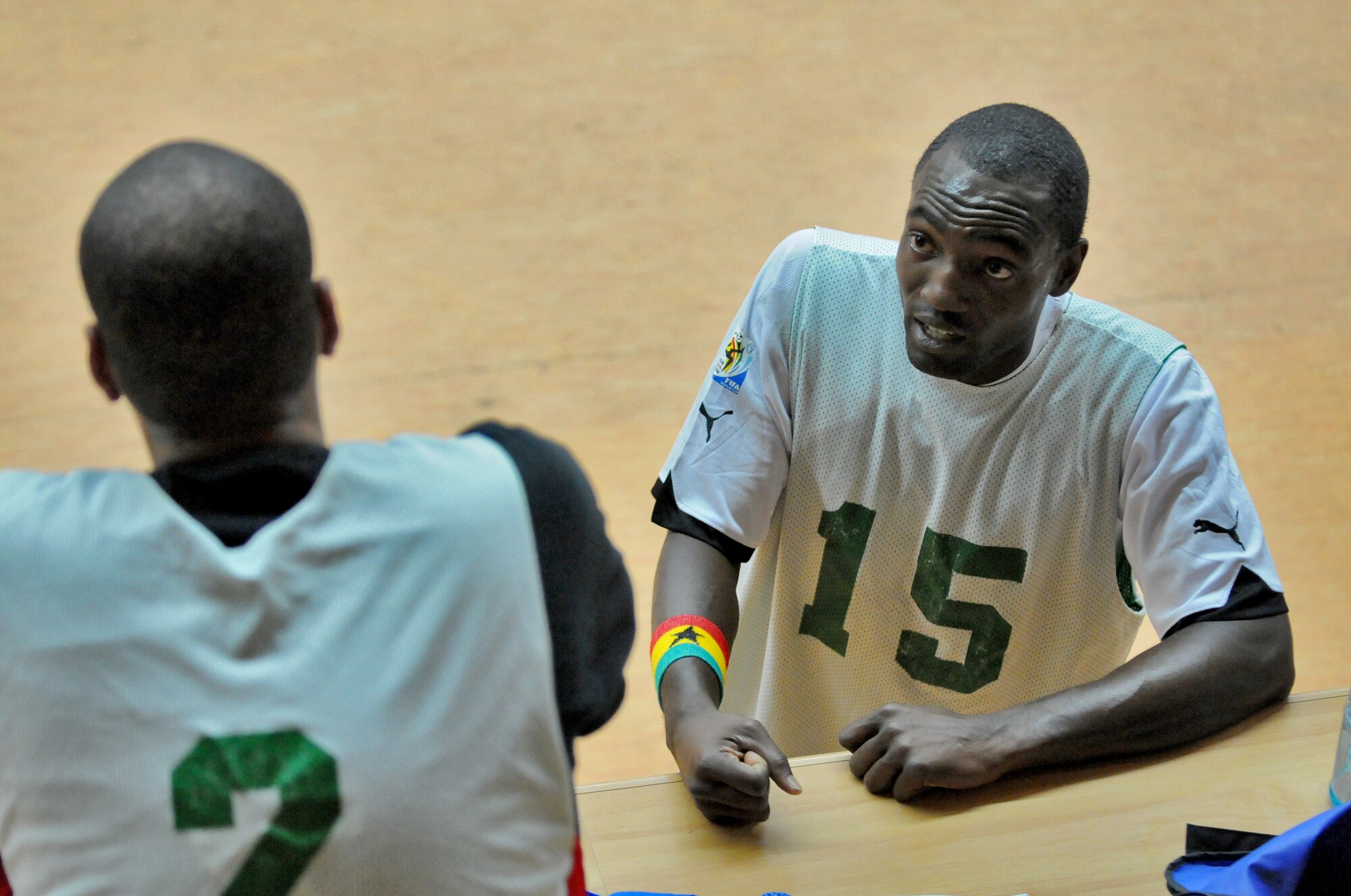 SPANGDAHLEM AIR BASE, Germany – Nana Opoku, 52nd Civil Engineer Squadron Force, strategizes with his teammate Robert Ivey during halftime during the 52nd Fighter Wing’s intramural indoor soccer championship game against the 52nd Force Support Squadron Sabers at the Skelton Memorial Fitness Center May 20. The Force defeated the Sabers 9-3 to win the championship.  (U.S. Air Force photo/Senior Airman Nick Wilson)