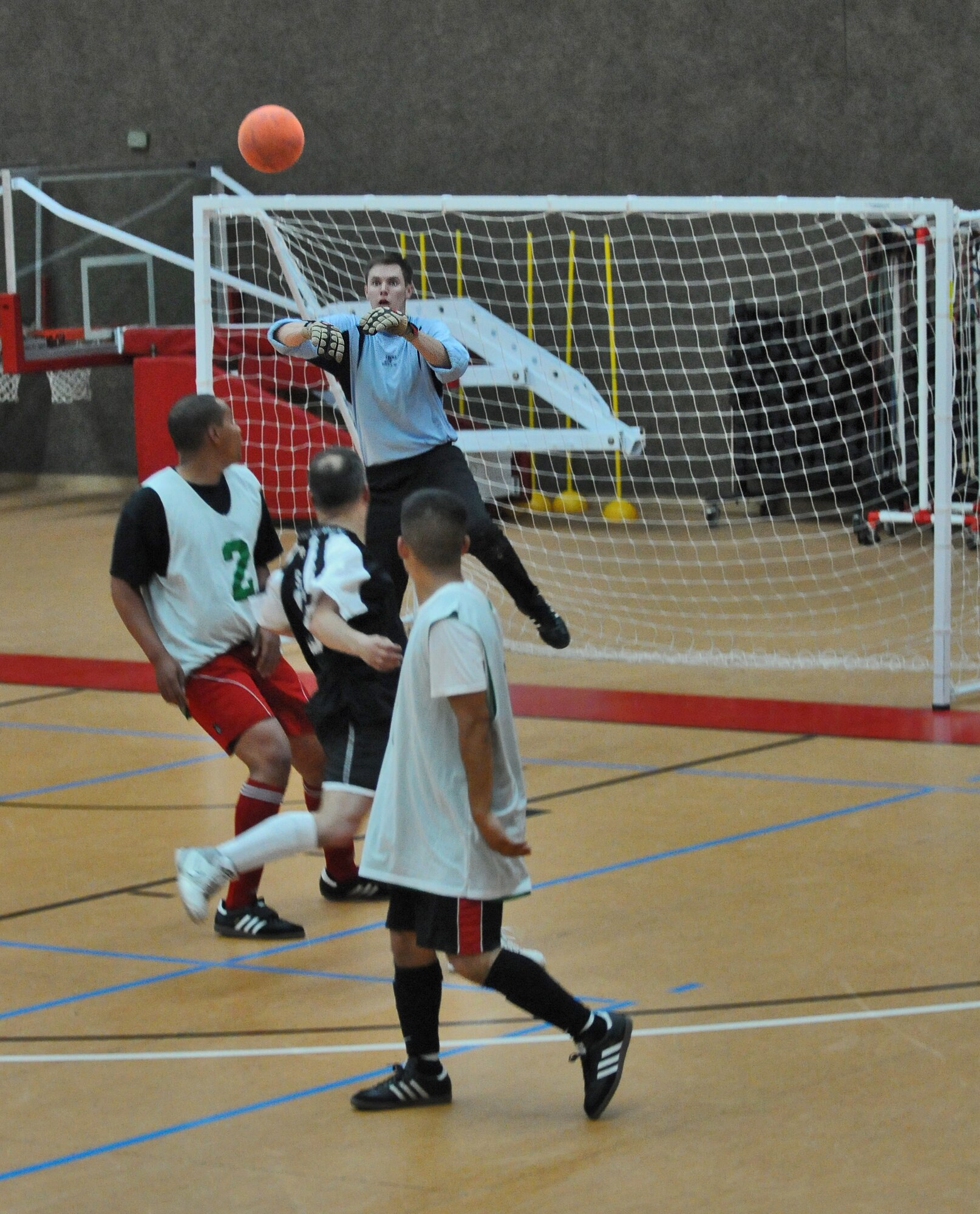 SPANGDAHLEM AIR BASE, Germany – Sean Conaway, 52nd Civil Engineer Squadron Force goalkeeper, blocks the ball during the 52nd Fighter Wing’s intramural indoor soccer championship game against the 52nd Force Support Squadron Sabers at the Skelton Memorial Fitness Center May 20. The Force defeated the Sabers 9-3 to win the championship.  (U.S. Air Force photo/Senior Airman Nick Wilson)