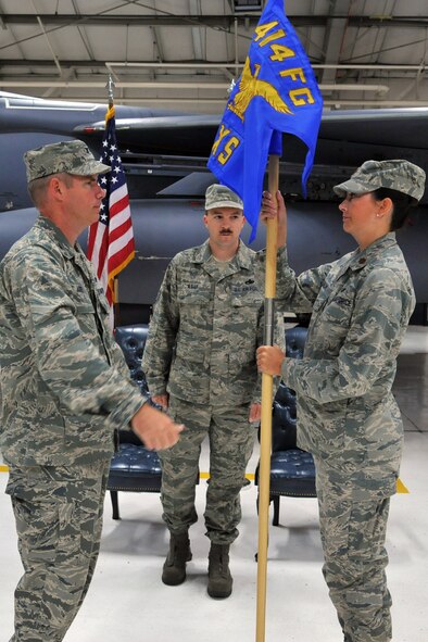 Maj. Lydia Black assumes command of the 414th Maintenance Squadron during an activation and appointment of command ceremony at Seymour Johnson Air Force Base, N.C., May 26, 2011. Major Black is the first commander of the 414th MXS. (U.S. Air Force photo by Senior Airman Whitney Lambert/Released) 

