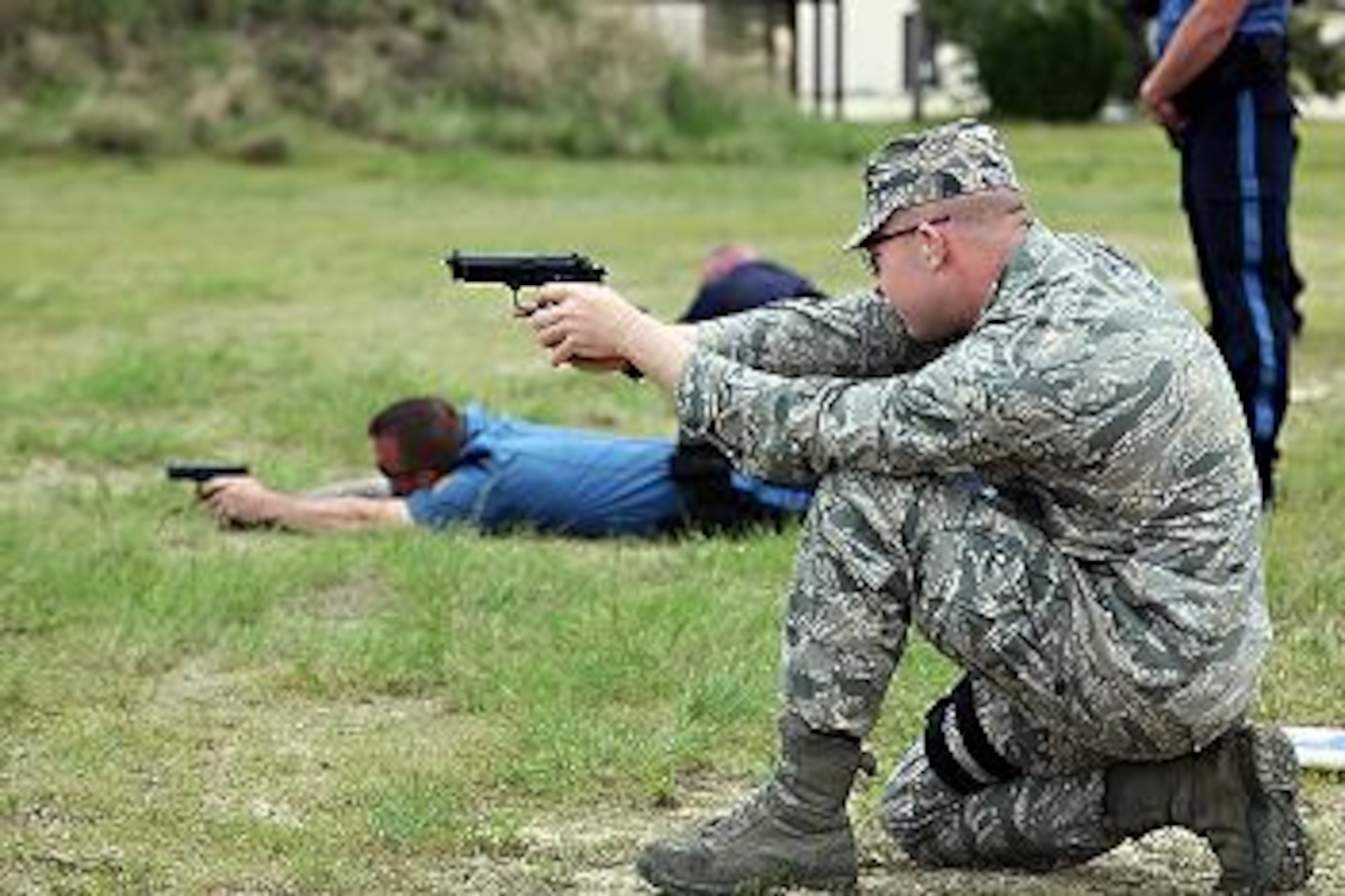 2nd Lt. Richard Glover, 87th Security Forces Squadron, takes aim during the team shooting competition in part of National Police Week May 19 at Joint Base McGuire-Dix-Lakehurst. The competition was open to the security forces of all branches of the military, local police forces, like Stafford and Barnegat Townships, and the Federal Corrections Institute to engage in friendly comrade. (U.S. Air Force photo by Wayne Russell/Released)