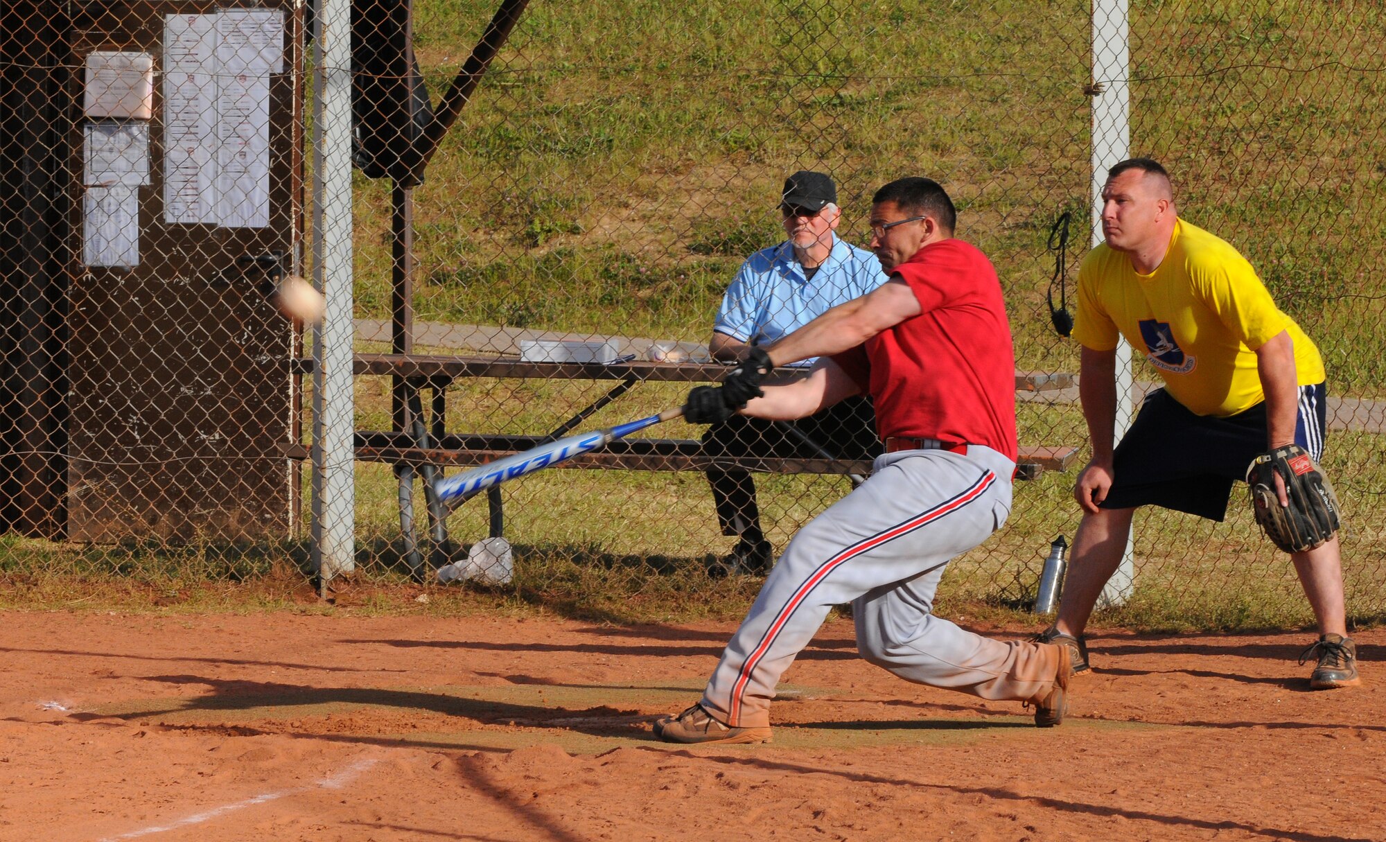 SPANGDAHLEM AIR BASE, Germany -- Albin Lutes, 52nd Logistics Readiness Squadron, smacks a homerun during an intramural softball game here May 24. The 52nd LRS defeated the 52nd Security Forces Squadron 10-8. The intramural softball league began May 23 and runs into August 2011.  (U.S. Air Force photo/Airman 1st Class Dillon Davis)