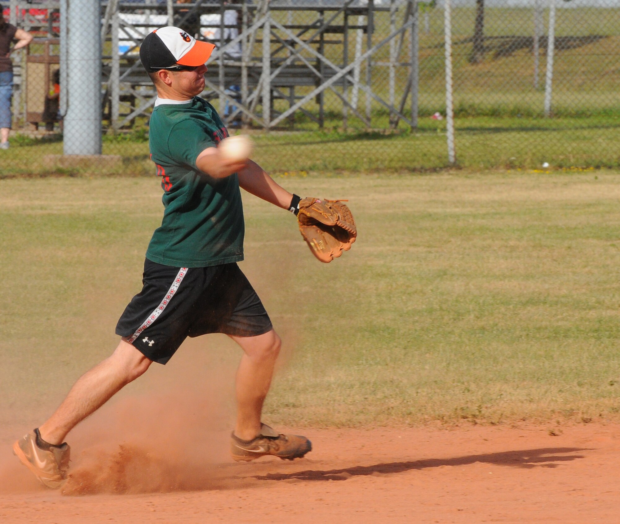 SPANGDAHLEM AIR BASE, Germany -- Christopher Bates, 52nd Logistics Readiness Squadron, to first during an intramural softball game here May 24. The 52nd LRS defeated the 52nd Security Forces Squadron 10-8. The intramural softball league began May 23 and runs into August 2011. (U.S. Air Force photo/Airman 1st Class Dillon Davis)