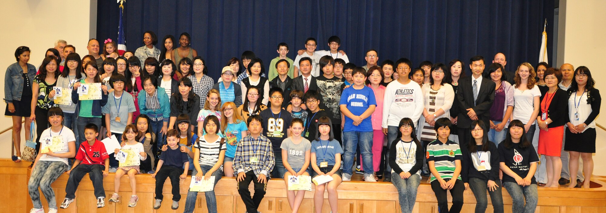 As part of the Good Neighbor Program members here recently invited 23 eighth graders from the Pyongtaek area into their homes to share some culture during the Osan Air Base-hosted English Camp. Fourteen families volunteered to support the 23 students during the three-day event. Each student lived with a host family on base and was paired with an eighth grade student from Osan Middle School. (U.S. Air Force photo/Staff Sgt. Chad Thompson)