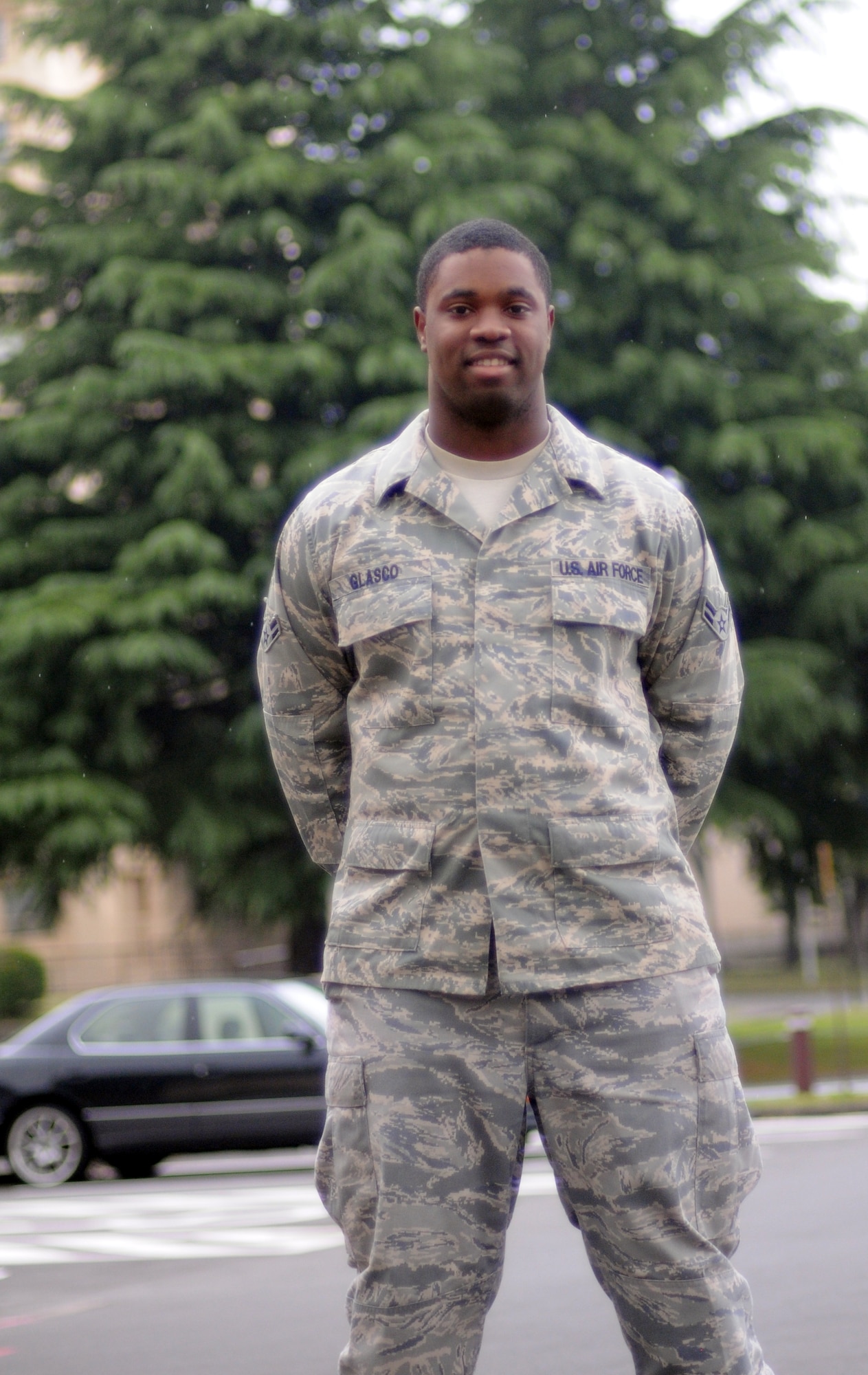 YOKOTA AIR BASE, Japan -- Airman 1st Class Thomas Glasco, 374th Medical Operations Squadron medical technician, poses for a picture and explains what Memorial Day means to him at Yokota Air Base, Japan, May 26, 2011. "Memorial Day is about honoring the memory of our fallen Wingmen, Soldiers, Marines, and Seamen", said Airman Glasco. (U.S. Air Force photo/Airman 1st Class Krystal M. Garrett) 