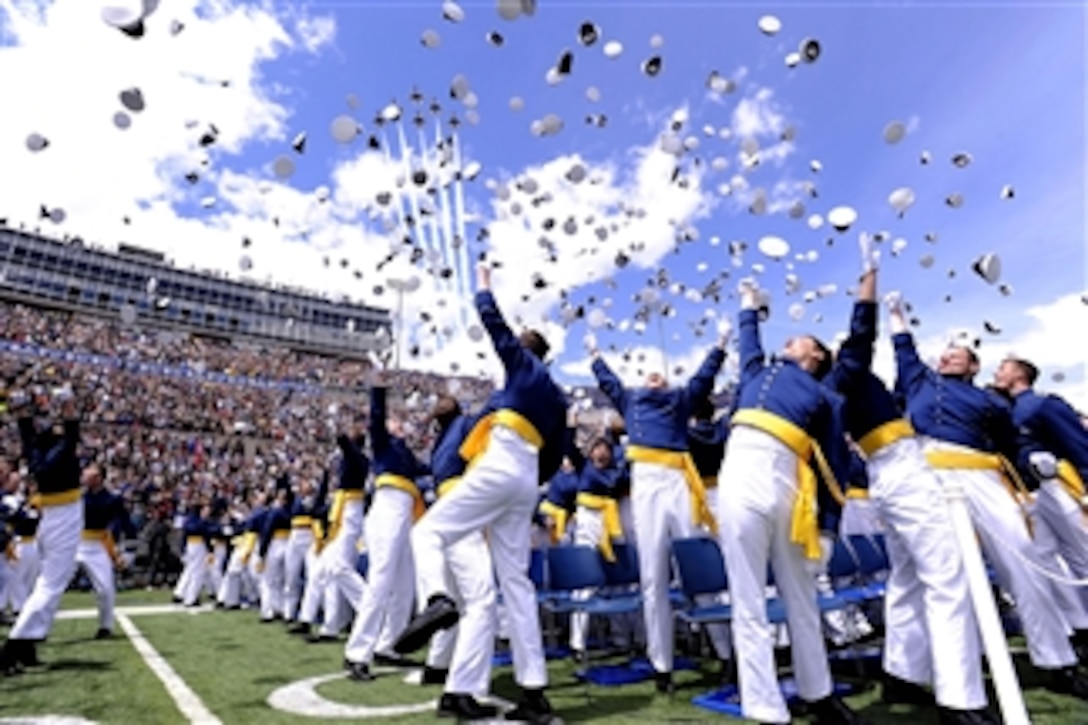 Newly commissioned 2nd lieutenants celebrate at the end of the U.S. Air Force Academy's Class of 2011 graduation ceremony in Colorado Springs, Colo., on May 25, 2011.  Secretary of the Air Force Michael B. Donley was the guest speaker at the commencement.  