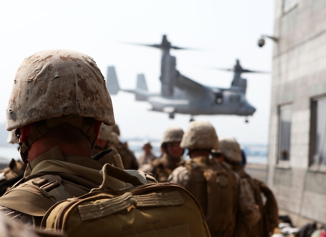 Marines with Fox Company, 2nd Battalion, 9th Marine Regiment, prepare for a beach assault demonstration at New York City’s Coney Island, May 26, 2011. Various units from II Marine Expeditionary Force and Marines Forces Reserve have organized under the 24th MEU to form the Special Purpose Marine Air Ground Task Force - New York. The Marines embarked on the Navy’s Amphibious Assault Ships, the USS Iwo Jima (LHD -7) and USS New York (LPD-21) to take part in Fleet Week New York 2011 from May 25 to June 1. The Marines will showcase the capabilities of the MAGTF, and also honor those who have served by participating in various events during the Memorial Day weekend.