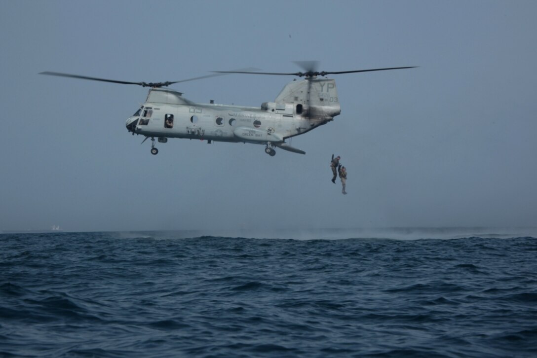 Marines from Reconnaissance Platoon, Headquarters and Service Company, Battalion Landing Team 1/1, 13th Marine Expeditionary Unit (MEU), conduct helocast training from a CH-46E “Sea Knight” belonging to Marine Medium Helicopter Squadron 163 (Reinforced), 13th MEU in the Persian Gulf during Exercise Nautical Union, May 26, 2011. This training provided reconnaissance Marines the first opportunity to practice this capability since they left on deployment in February. The 13th MEU is deployed with Boxer Amphibious Ready Group as the U.S. Central Command theater reserve force, also providing support for maritime security operations and theater security cooperation efforts in the U.S. 5th Fleet area of responsibility.(Official U.S. Marine Corps photo by Cpl. Christopher O’Quin/ Released)