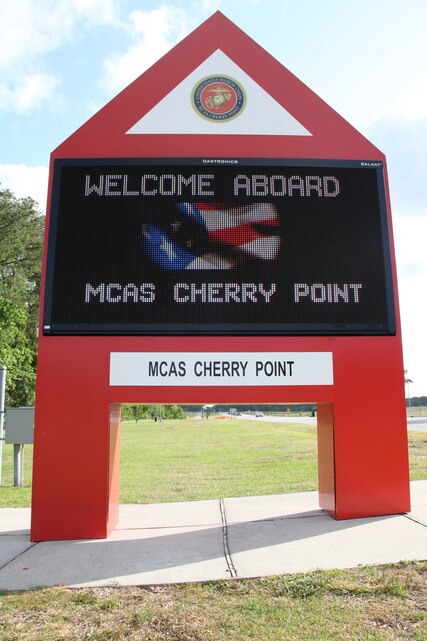 This marquee stands near the intersection of Slocum Road and Roosevelt Boulevard welcoming people aboard MCAS Cherry Point May 27. The marquees are one method the Joint Public Affairs uses to inform the public about emergencies, weather and flag conditions. The new marquees are more effective at sending messages to people aboard the air station and are more energy efficient at the same time.