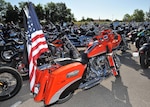 More than 450 motorcycles fill the parking lot of Gruene Harley-Davidson in New Braunfels prior to the San Antonio Ride 4 Troops May 14. The Lackland Green Knights' motorcycle club participated in the ride, raising more than $20,000 for local Fisher Houses. (U.S. Air Force photo/Alan Boedeker)