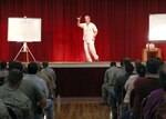 Steve Verret, a standup comedian and traffic safety expert, uses comedy to deliver traffic safety information during the safety expo May 24 at Arnold Hall. The Critical Days of Summer safety campaign kicked off May 27 and continue through Sept. 5. The campaign's vision is for all Airmen to have an injury-free summer. (U.S. Air Force photo/Robbin Cresswell)