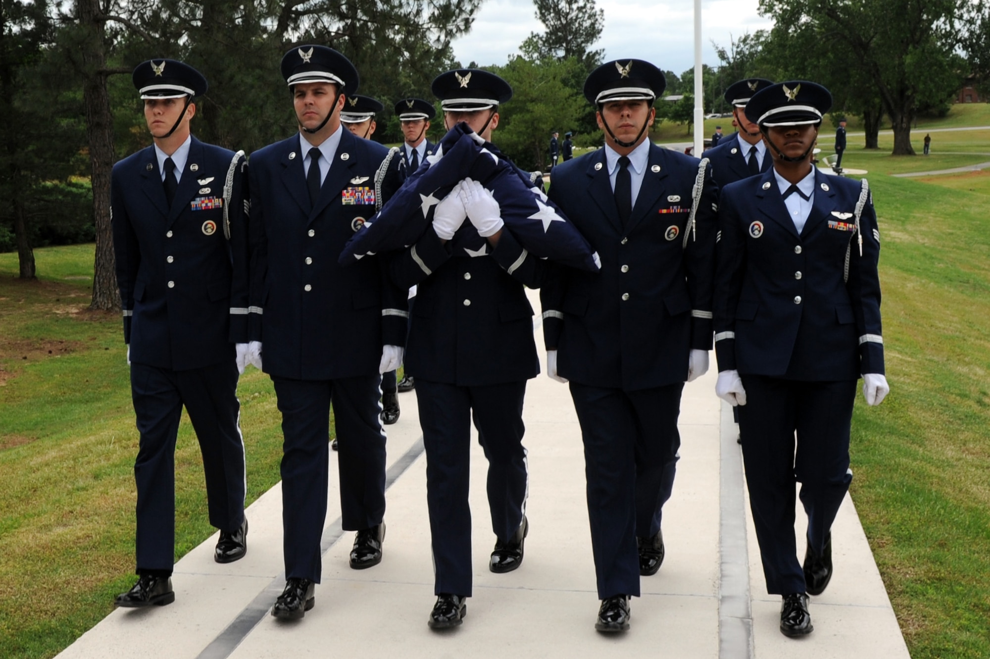 Base honor guard members “retire the colors” during a Memorial Day retreat ceremony May 26, 2011, at Little Rock Air Force Base, Ark. The ceremony was a chance for Airmen and community members to honor the military men and women who have fallen through the years. (U.S. Air Force photo /Airman 1st Class Rusty Frank)