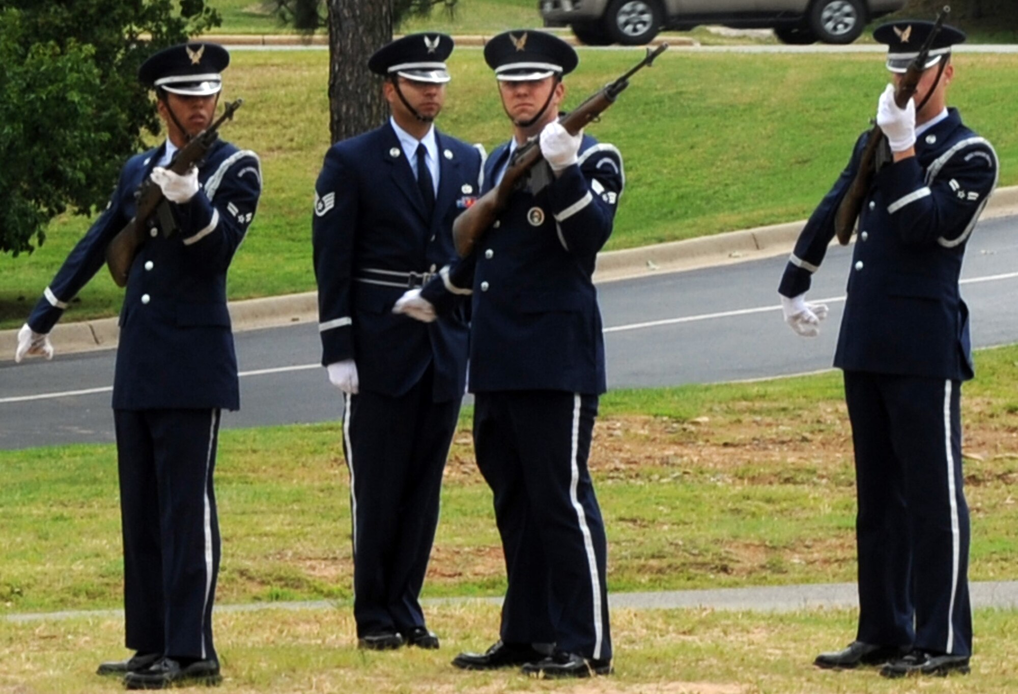 Members of the base honor guard perform a 21-gun salute during a Memorial Day retreat ceremony May 26, 2011, at Little Rock Air Force Base, Ark. The ceremony was a chance for Airmen and community members to honor the military men and women who have fallen through the years. (U.S. Air Force photo /Airman 1st Class Rusty Frank)