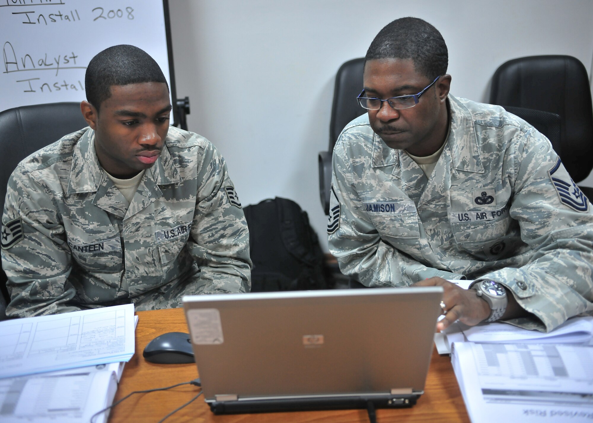 Staff Sgt. Jermaine Canteen, 39th Operations Squadron Intelligence, and Master Sgt. Jamie Jamison, 39th Security Forces Squadron, work together on a scenario during Integrated Defense Risk Management Process and Force Protection training May 12, 2011 at Incirlik Air Base, Turkey.  The week-long training was designed to familiarize the Airman with ForcePRO software and look at security vulnerabilities differently.  (U.S. Air Force photo by Staff Sgt. Alexandre Montes/Released)