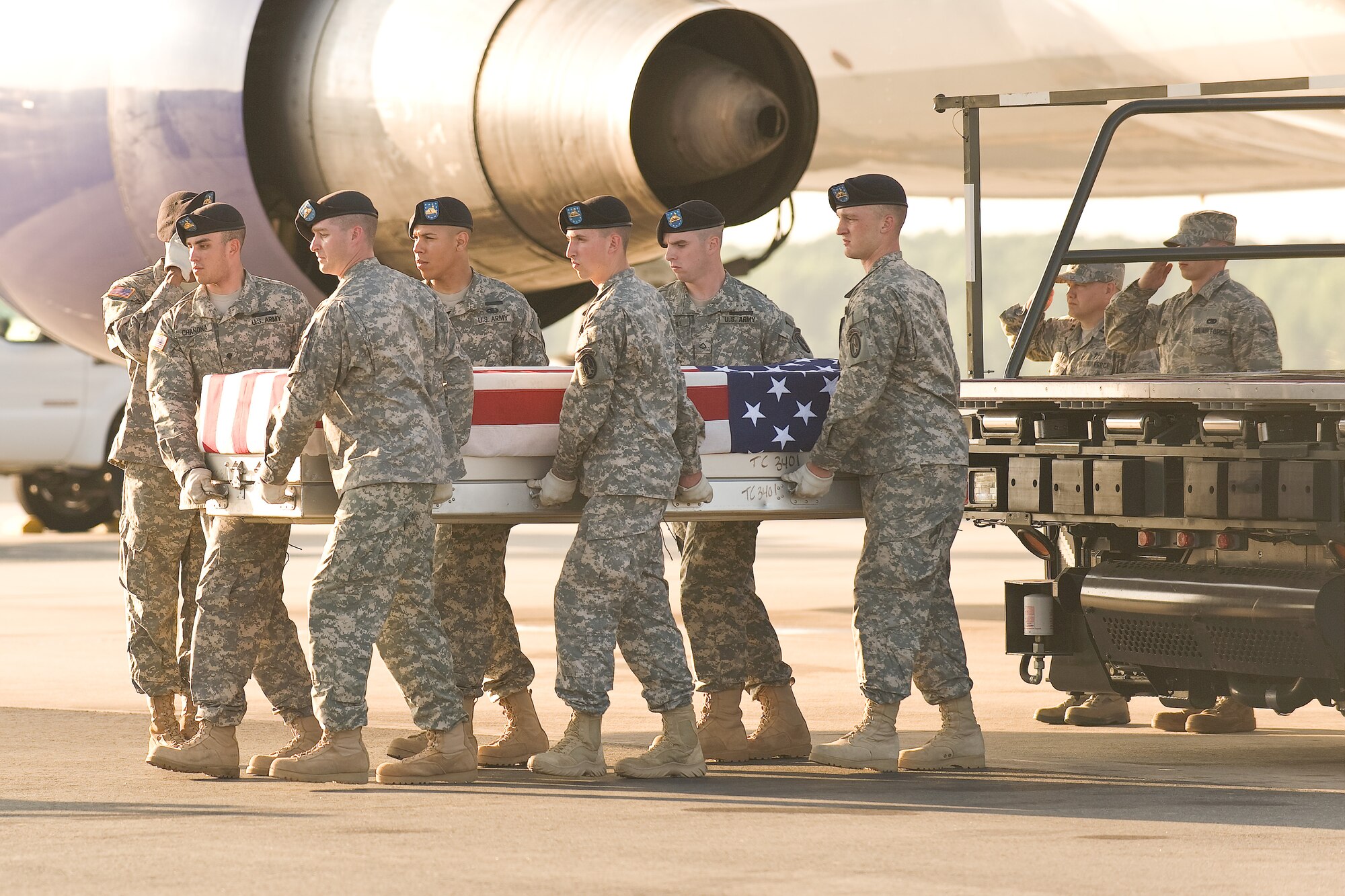 A U.S. Army carry team transfers the remains of Army Sgt. Thomas A. Bohall, of Bel Aire, Kan., at Dover Air Force Base, Del., May 28, 2011. Bohall was assigned to the 4th Battalion, 101st Aviation Regiment, 159th Combat Aviation Brigade, 101st Airborne Division (Air Assault), Fort Campbell, Ky. (U.S. Air Force photo/Roland Balik)