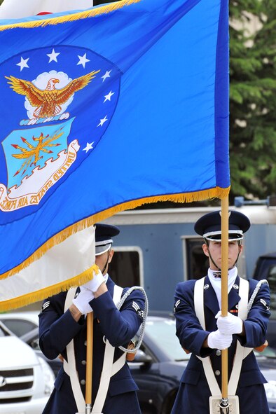 KUNSAN AIR BASE, Republic of Korea -- The base Honor Guard performs during the 2011 Memorial Day ceremony here May 27. The first major observance of Memorial Day was held that in 1868 at Arlington National Cemetery. (U.S. Air Force photo/Senior Airman Brittany Y. Bateman)