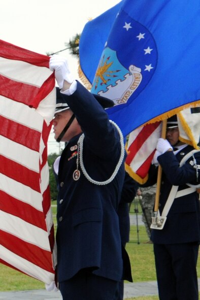 KUNSAN AIR BASE, Republic of Korea -- The Honor Guard performs during the 2011 Memorial Day ceremony here May 27. Memorial Day honors all American service members for their sacrifices and dedication. (U.S. Air Force photo/Senior Airman Brittany Y. Bateman)