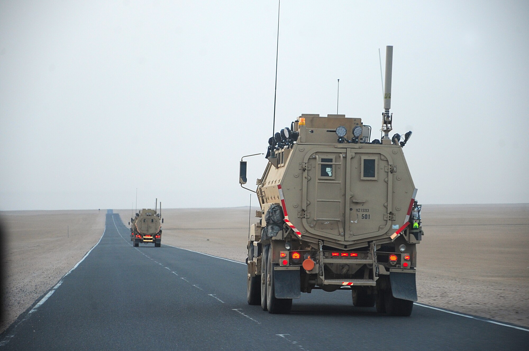 Joint Expeditionary Tasking Airmen assigned to the 387th Expeditionary Logistics Readiness Squadron return to base after being greeted by squadron, group and wing leaders in the early morning hours following a convoy mission near a host-nation border. Colonel Tal Metzgar, 387th Air Expeditionary Group commander; Chief Master Sgt. Richard Turcotte, 386th Air Expeditionary Wing command chief; Lt. Col. Chris Boone, 387th Expeditionary Logistics Readiness Squadron commander;  and Chief Master Sgt. James Muncy, 387th ELRS superintendent, were among those who visited the 387th's combat truckers. (U.S. Air Force photo by Senior Airman Cynthia Spalding)