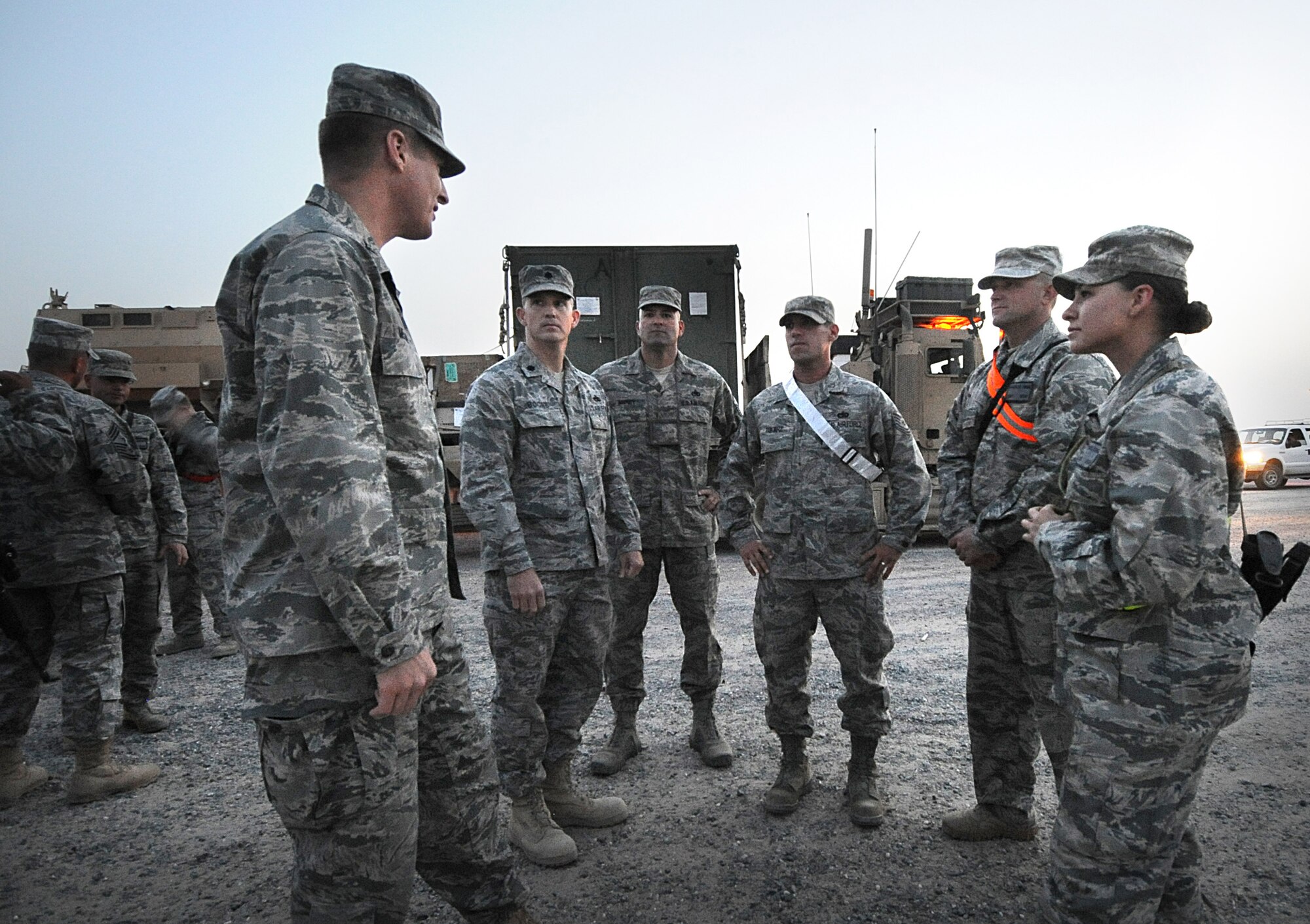 Joint Expeditionary Tasking Airmen assigned to the 387th Expeditionary Logistics Readiness Squadron were greeted by squadron, group and wing leaders in the early morning hours following a convoy mission near a host-nation border. Colonel Tal Metzgar, 387th Air Expeditionary Group commander; Chief Master Sgt. Richard Turcotte, 386th Air Expeditionary Wing command chief; Lt. Col. Chris Boone, 387th Expeditionary Logistics Readiness Squadron commander;  and Chief Master Sgt. James Muncy, 387th ELRS superintendent, were among those who visited the 387th's combat truckers. (U.S. Air Force photo by Senior Airman Cynthia Spalding)