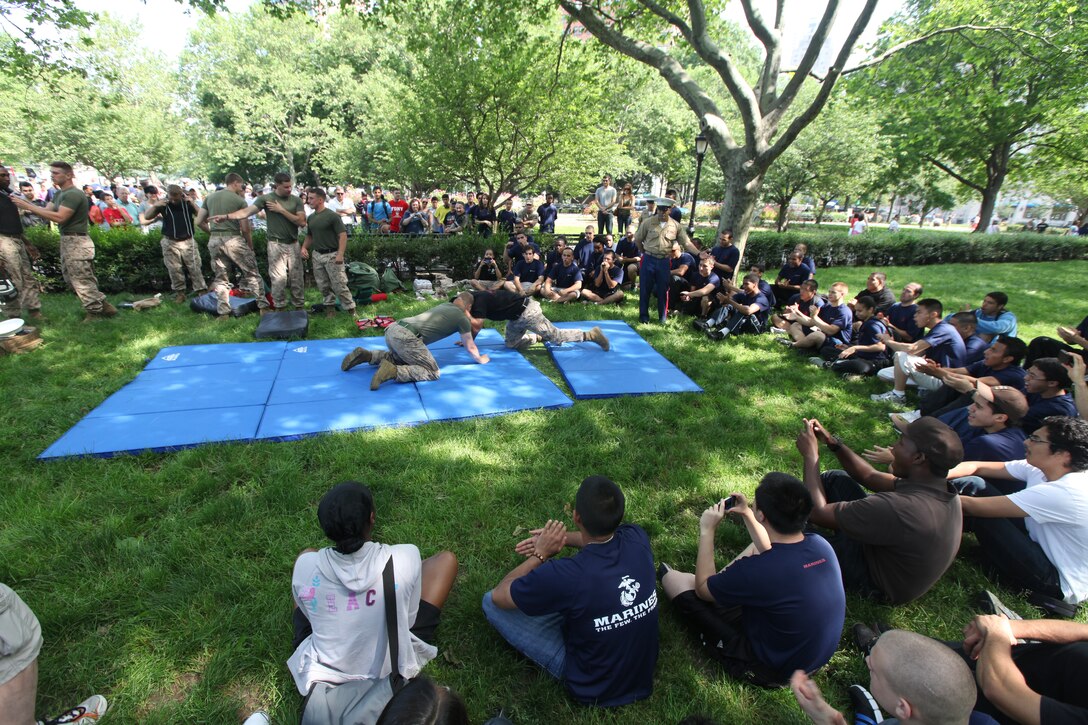 Marines with 2nd Battalion, 9th Marine Regiment, currently attached to the 24th Marine Expeditionary Unit, demonstrate maneuvers from the Marine Corps Martial Arts Program to New Yorkers and tourists at, Battery Park, May 28. Various units from II Marine Expeditionary Force and Marines Forces Reserve have organized under the 24th Marine Expeditionary Unit to form the Special Purpose Marine Air Ground Task Force - New York. The Marines embarked on the Navy’s Amphibious Assault Ships, the USS Iwo Jima (LHD -7) and USS New York (LPD-21) to take part in Fleet Week New York 2011 from May 25 to June 1. The Marines will showcase the capabilities of the MAGTF, and also honor those who have served by participating in various events during the Memorial Day weekend.