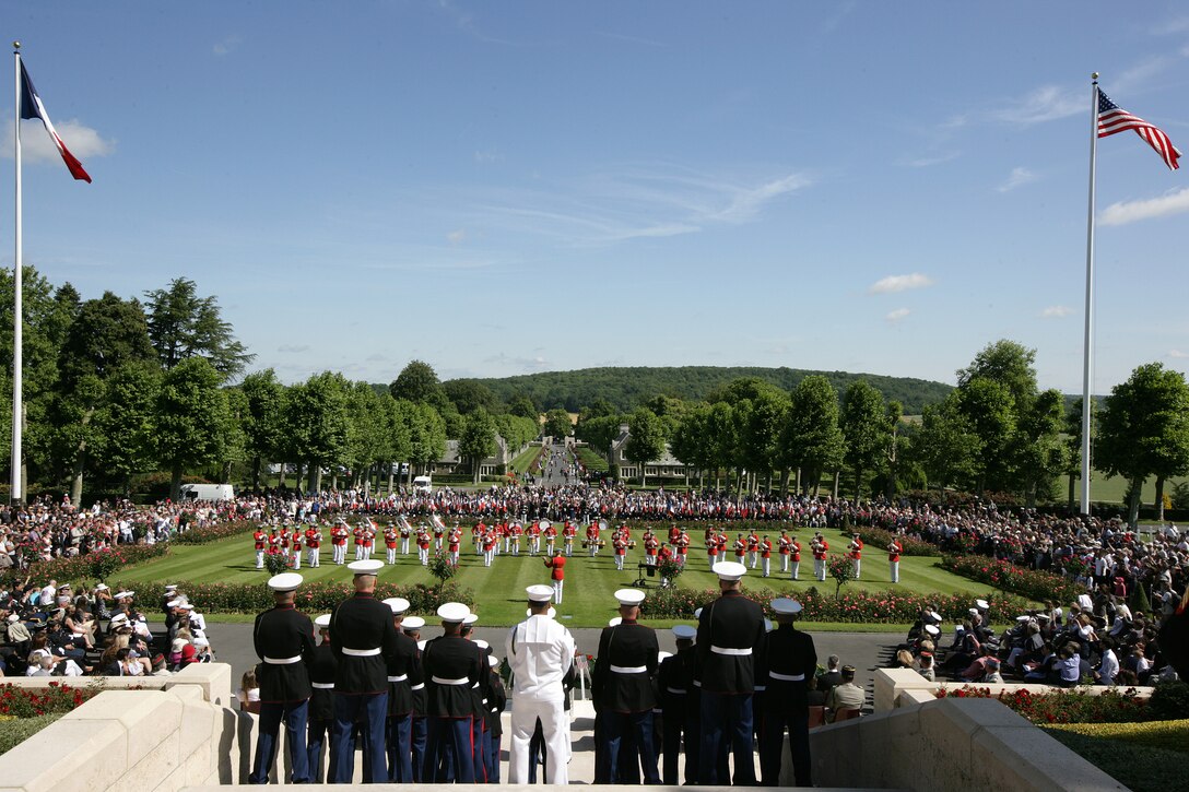 The “Commandant’s Own” drum and bugle corps performed in front of a crowd of more than 2000 on the parade field of the Aisne-Marne American Cemetery during a Memorial Day ceremony in honor of the 93rd anniversary of the Battle of Belleau Wood. More than 1,800 Marines from the 5th and 6th Regiments lost their lives in the 21-day battle that stopped the last German offensive in 1918. (Marine Corps photo by Master Sgt. Grady T. Fontana)