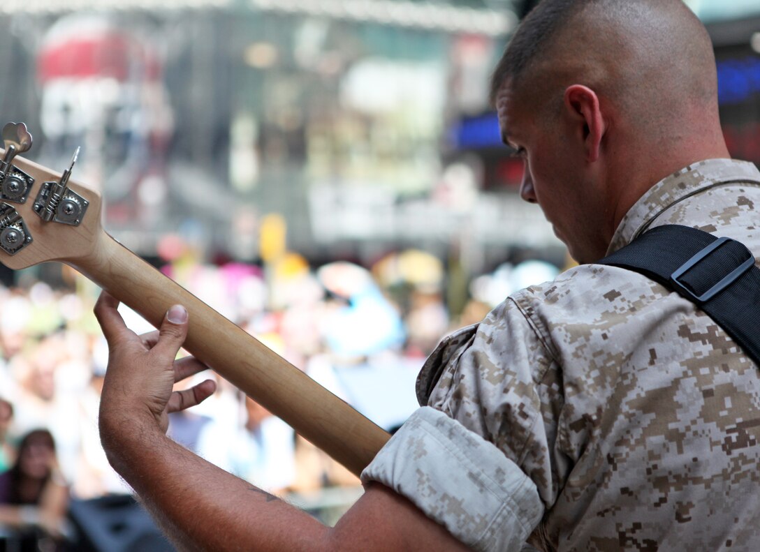 Marines with the Marine Corps Band New Orleans perform at Times Square May 29, 2011. Various units from II Marine Expeditionary Force and Marine Forces Reserve have organized under the 24th Marine Expeditionary Unit to form the Special Purpose Marine Air Ground Task Force - New York. The Marines embarked on the Navy's Amphibious Assault Ships, the USS Iwo Jima (LHD -7) and USS New York (LPD-21) to take part in Fleet Week New York 2011 from May 25 to June 1. The Marines will showcase the capabilities of the MAGTF, and also honor those who have served by participating in various events during the Memorial Day weekend.