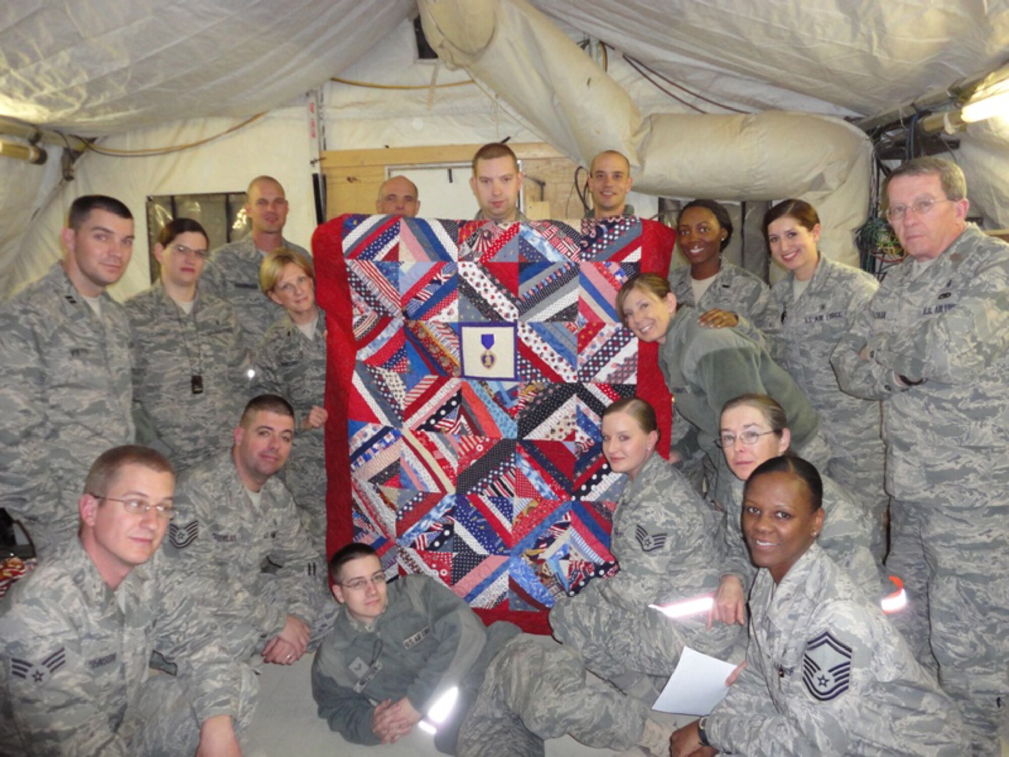 Shortly after the January arrival of the current contingency aeromedical staging facility team, quilts began arriving at the clinic. Wanting to provide something special for the wounded warriors and hoping to provide a touch of home, Jill Shaver, from Murfreesboro, Tenn., began fashioning homemade quilts and sending them to the CASF team. (U.S. Air Force courtesy photo)