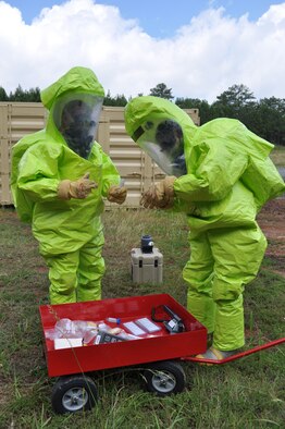 Airman First Class Anton Hanley of the 439th Airlift Wing at Westover Air Reserve Base, Mass. and Senior Airman Brian Vermeesch, of the 911th Airlift Wing at Pittsburgh International Airport, Pa. take an air sample during an exercise.  The Emergency Management exercise took place at Dobbins Air Reserve Base, Ga. and test and improve the skills of the Emergency Management team. (U.S. Air Force photo by Lt. Col. Chad E. Gibson)