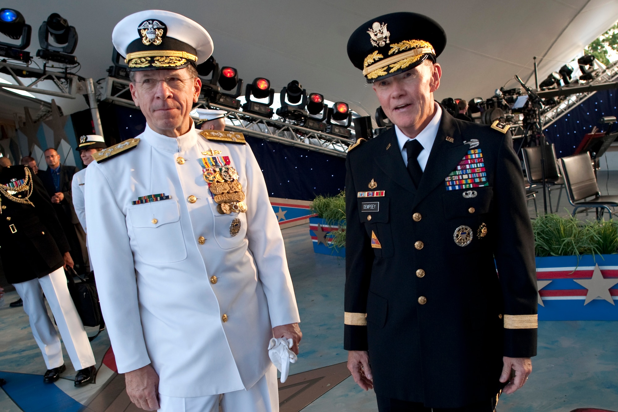 President Barack Obama announced Army Gen. Martin E. Dempsey as his choice as chairman of the Joint Chiefs of Staff during a Rose Garden ceremony May 30, 2011. Here, Navy Adm. Mike Mullen, chairman of the Joint Chiefs of Staff, speaks with General Dempsey May 29 prior to the 2011 National Memorial Day Concert at the U.S. Capitol in Washington, D.C.  (Defense Department photo/Petty Officer 1st Class Chad J. McNeeley) 