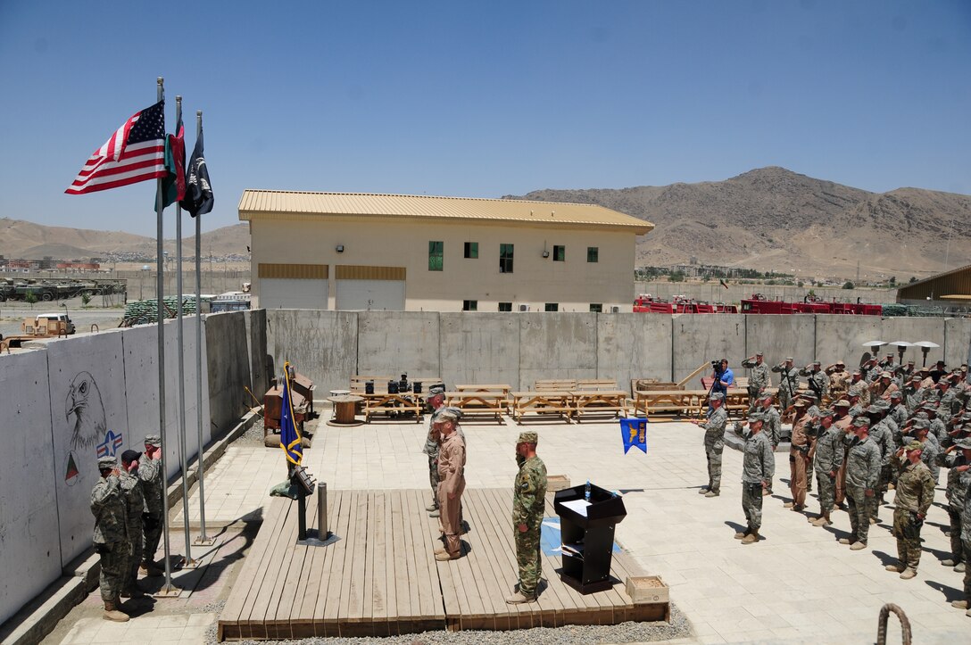 KABUL, Afghanistan - Members of the 438th Air Expeditionary Wing, gather to commemorate Memorial Day. The day serves to honor military members currently serving and those that have died while in military service. Many Americans observe Memorial day by visiting cemeteries and memorials with the U.S. flag usually flying at half staff. (U.S. Air Force photo by Senior Airman Amber Williams)
