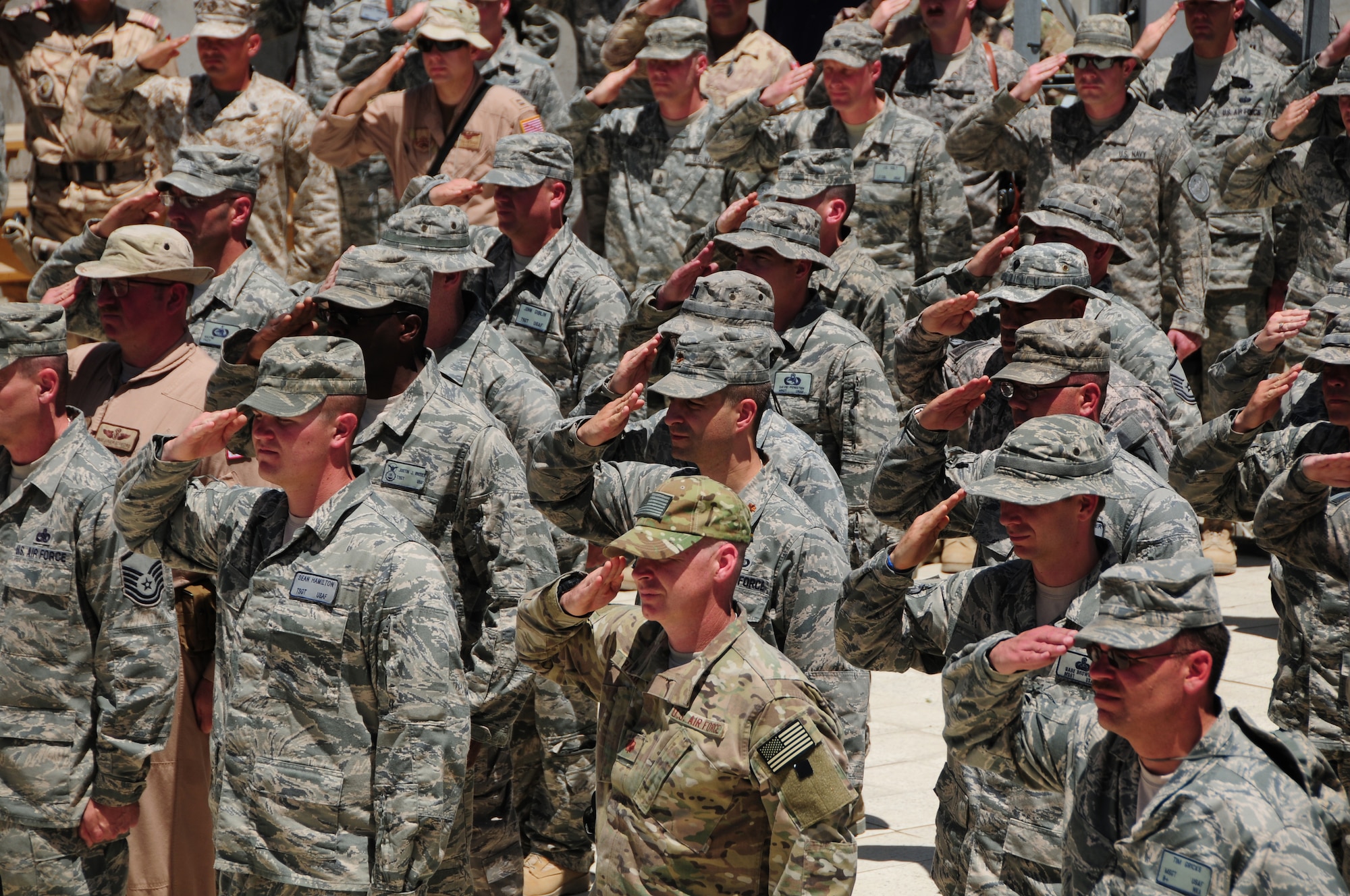 KABUL, Afghanistan - Members of the 438th Air Expeditionary Wing gather to commemorate Memorial Day. The day serves to honor military members currently serving and those that have died while in military service. Many Americans observe Memorial day by visiting cemeteries and memorials with the U.S. flag usually flying at half staff. US Air Force Photo by  Senior Airman Amber Williams