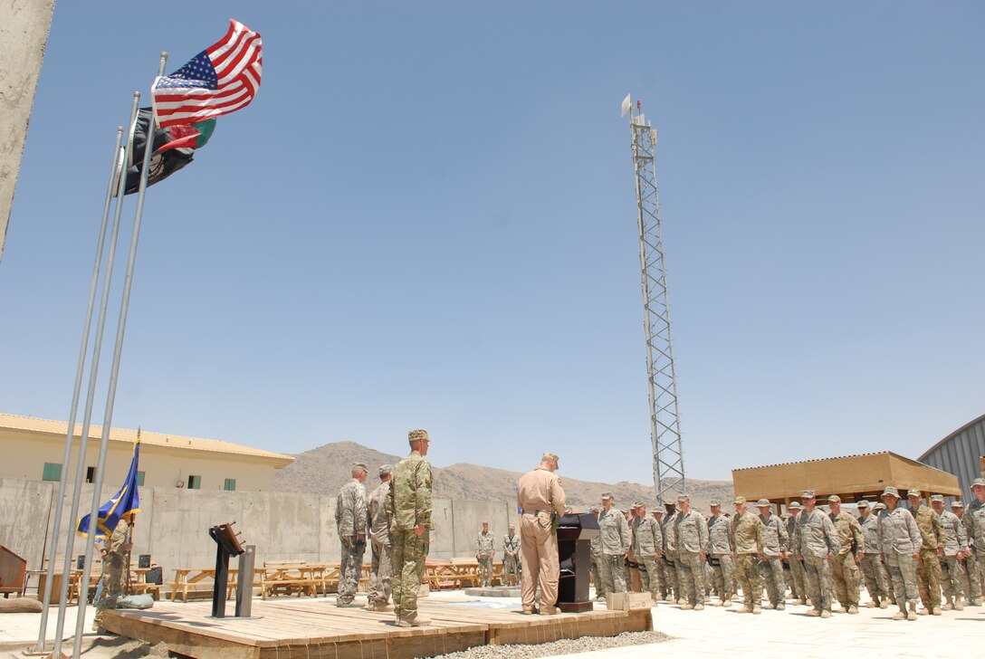 KABUL, Afghanistan - Members of the 438th Air Expeditionary Wing, gather to commemorate Memorial Day.  The day serves to honor military members currently serving and those that have died while in military service.  Many Americans observe Memorial day by visiting cemeteries and memorials with the U.S. flag usually flying at half staff.  (US Air Force Photo by Tech. Sgt. Brian E. Christiansen)