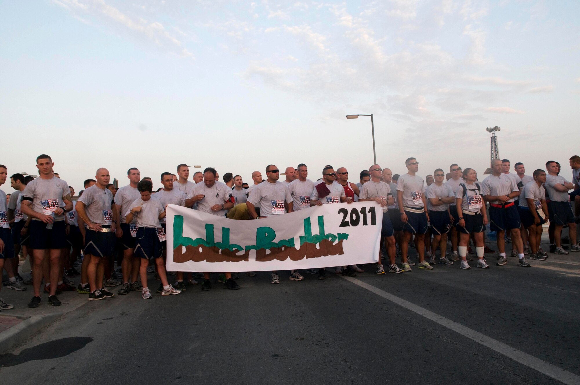 U.S. and coalition service members line up to run in the Bolder Boulder 10K May 30 in Southwest Asia.  (U.S. Air Force photo/Staff Sgt. Anthony Graham)