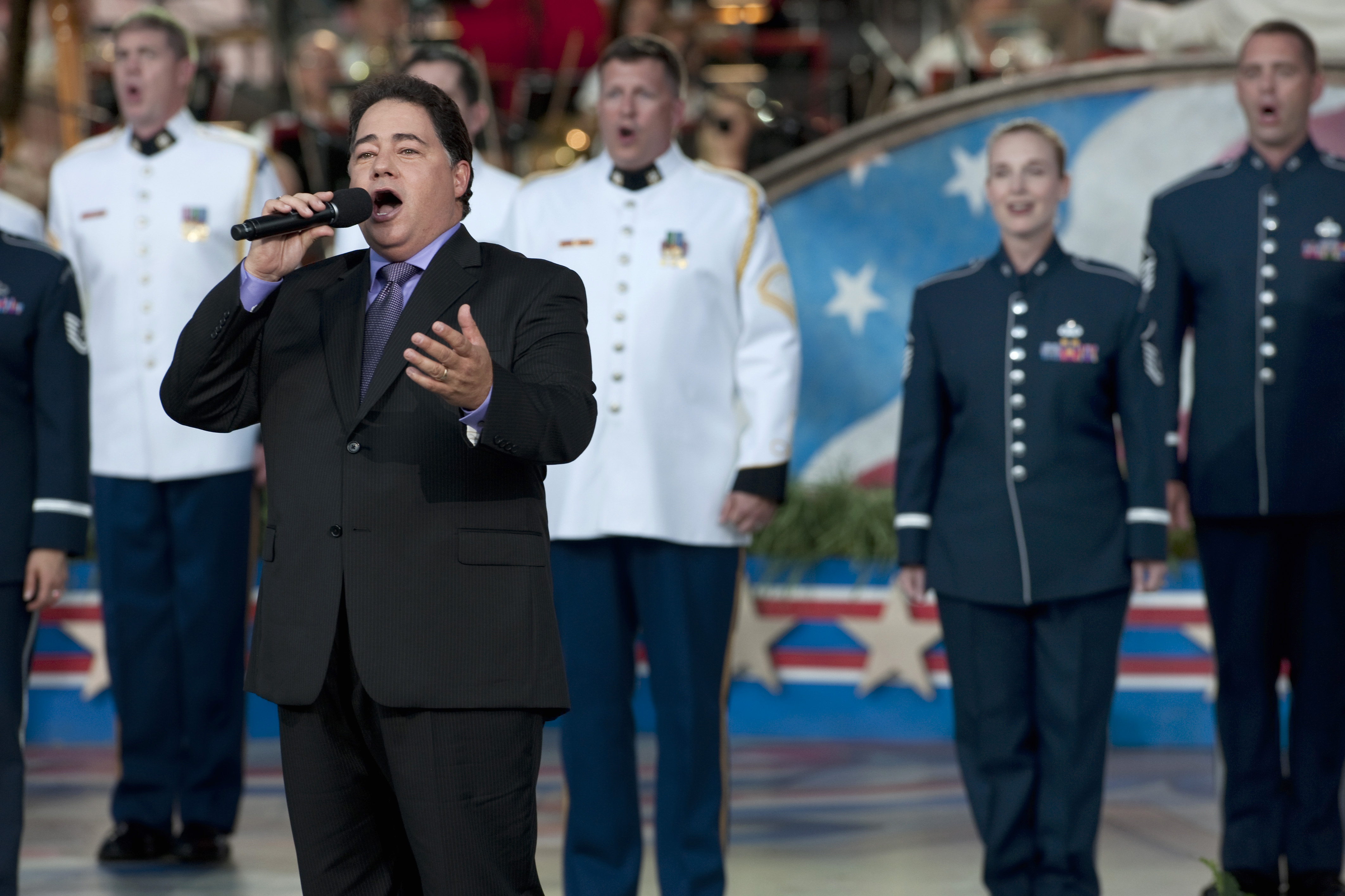 Former New York City police officer Daniel Rodriguez sings "God Bless