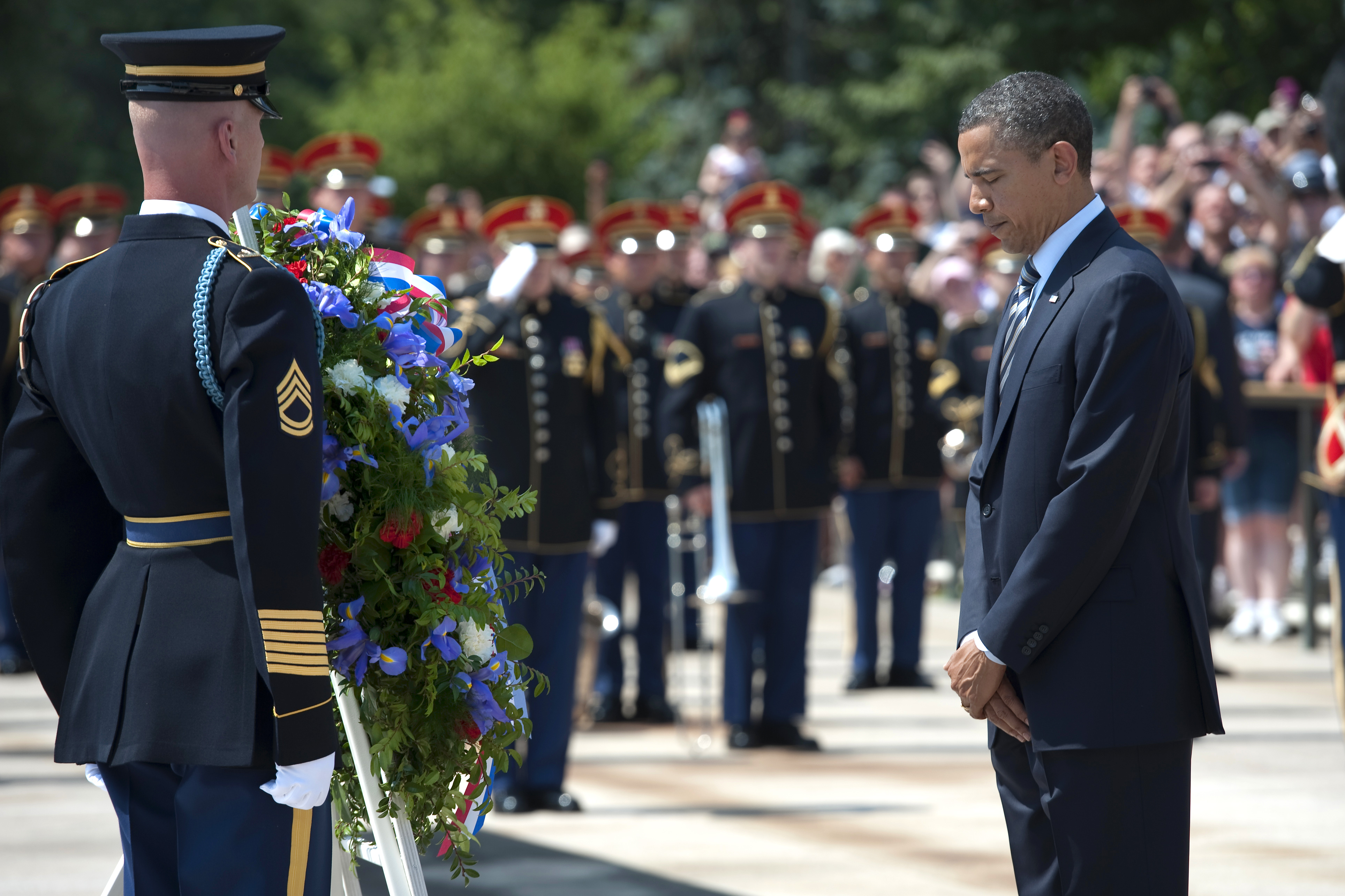 President Barack Obama Bows His Head In A Moment Of Silence After Laying A Wreath At