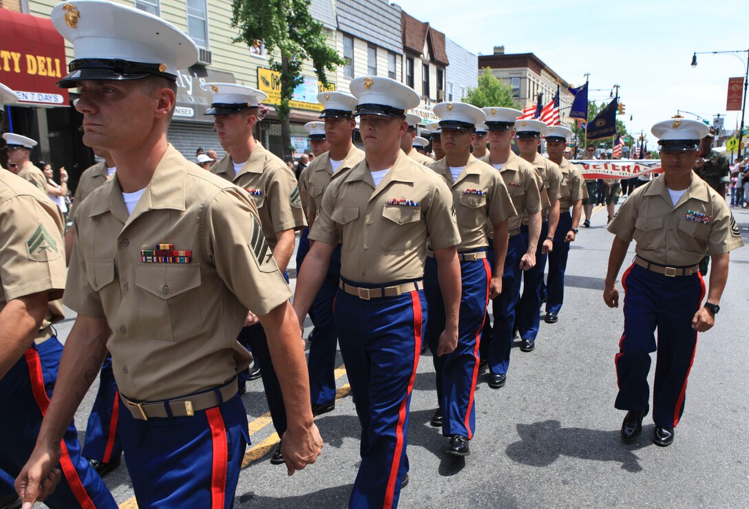 Marines from the 24th Marine Expeditionary Unit march in a Memorial Day parade at Glendale, New York, May 30, 2011. Various units from II Marine Expeditionary Force and Marines Forces Reserve have organized under the 24th Marine Expeditionary Unit to form the Special Purpose Marine Air Ground Task Force - New York. The Marines are embarking on the Navy’s Amphibious Assault Ships, the USS Iwo Jima (LHD -7) and USS New York (LPD-21) to take part in New York City's Fleet Week from May 25 to June 1, 2011. There, the Marines will showcase the capabilities of the MAGTF, and also honor those who have served by participating in a various of events during the Memorial Day weekend.