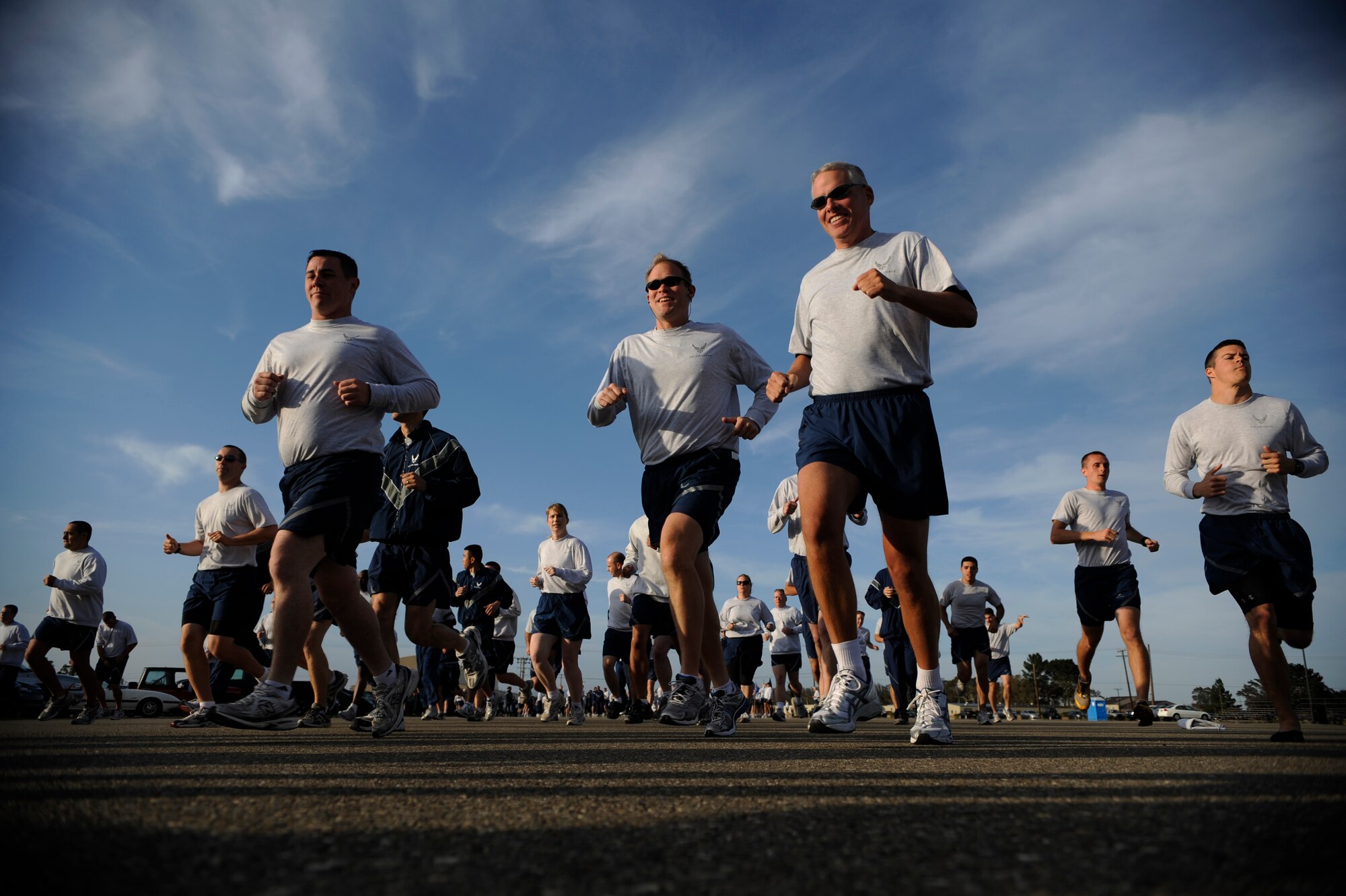 VANDENBERG AIR FORCE BASE, Calif. -- Team V members begin to run during the Wing Run at the parade grounds here Tuesday, May 31, 2011.  The 30th WS led the Wing Run before the squadron inactivates on Friday, June 3.  (U.S. Air Force photo/Staff Sgt. Andrew Satran) 

   