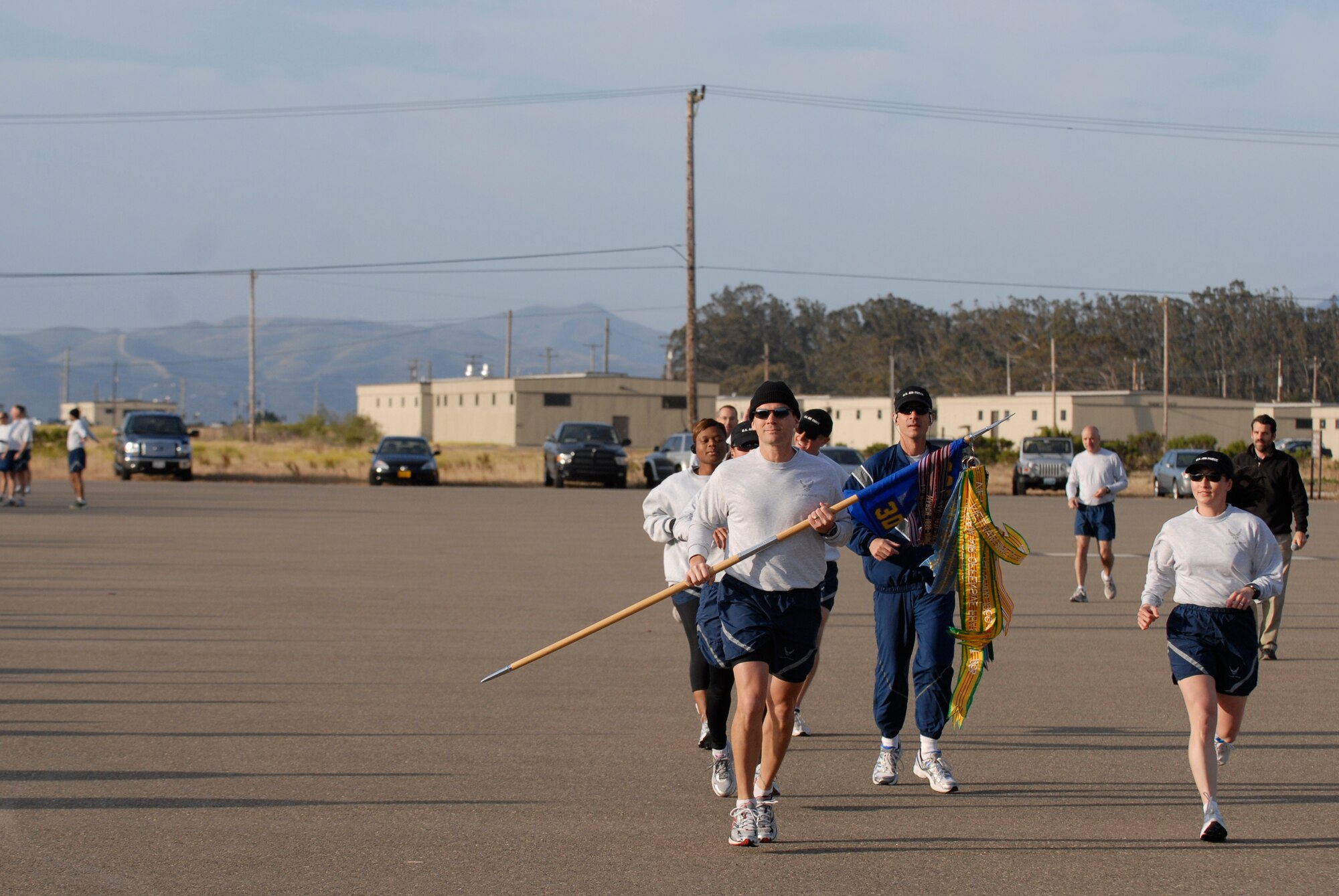 VANDENBERG AIR FORCE BASE, Calif. -- The 30th Weather Squadron led the Wing Run at the parade grounds here Tuesday, May 31, 2011.  The 30th WS led their last  Wing Run before the squadron inactivates on Friday, June 3.  (U.S. Air Force photo/Staff Sgt. Andrew Satran) 

  