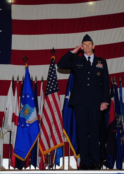 MINOT AIR FORCE BASE, N.D. -- Col. James Dawkins, 5th Bomb Wing commander, receives his first salute from wing personnel during the 5th Bomb Wing change of command ceremony here May 31. Colonel Dawkins will lead as the 51st commander of the 5th Bomb Wing “Warbirds.” The change of command ceremony is one of the Air Force’s time-honored traditions. (U.S. Air Force photo/Senior Airman Michael J. Veloz)