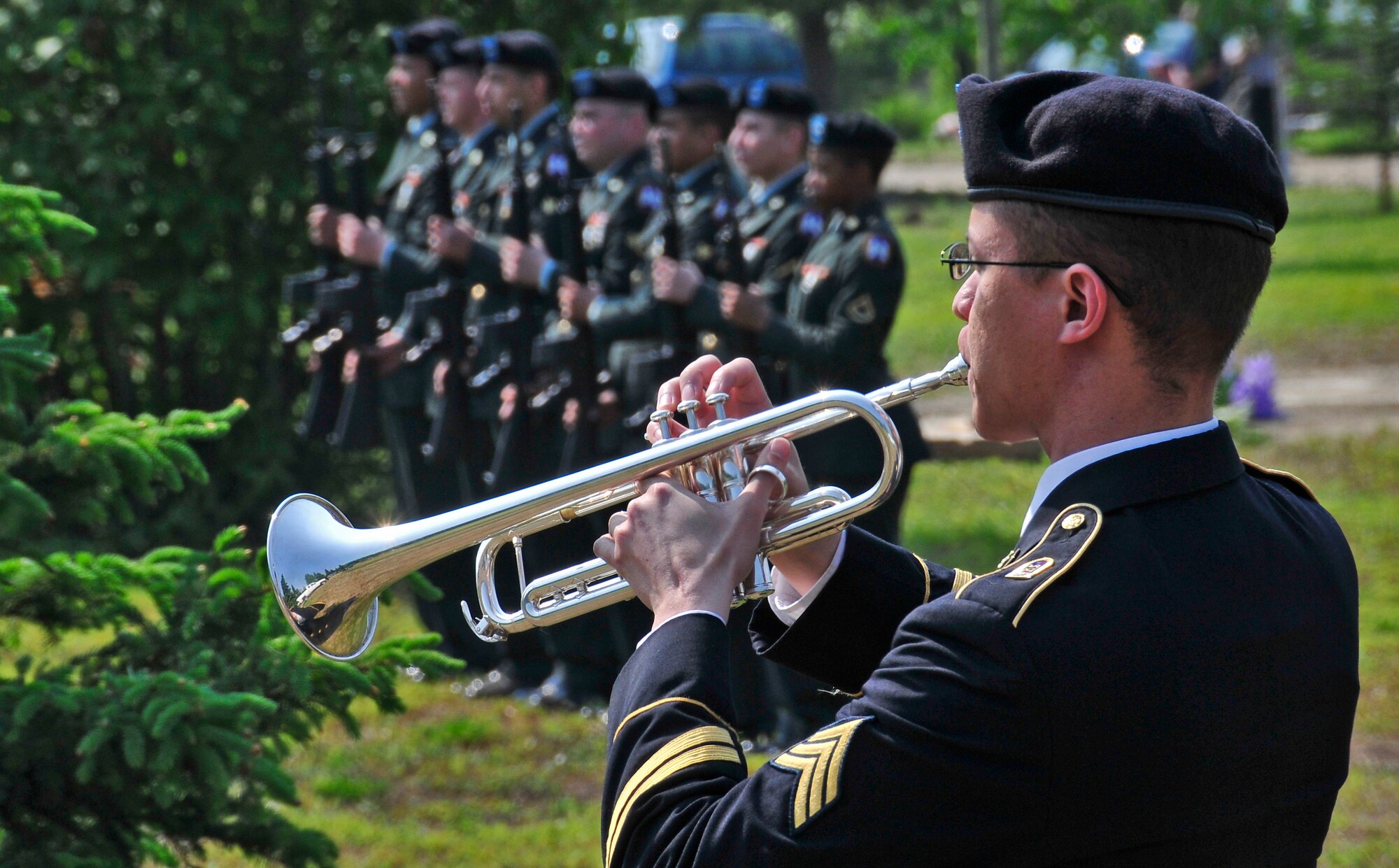 Taps is played during a Memorial Day ceremony at Birch Hill Cemetery May 30, 2011, Fairbanks, Alaska.  The American Legion Post 30 held services throughout Fairbanks in honor of all men and women who served in the U.S. Armed Forces.  (U.S. Air Force photo/Staff Sgt. Miguel Lara III)