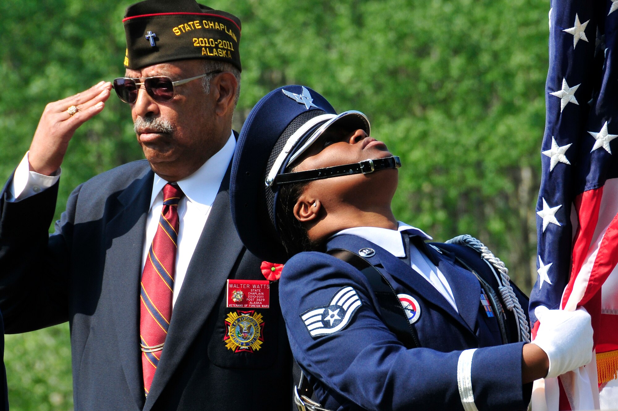 Walter Watts, of the Veterans of Foreign Wars Post 3629, renders a salute during the posting of the colors performed by the Eielson Air Force Base Honor Guard during a Memorial Day service at Birch Hill Cemetery May 30, 2011, Fairbanks, Alaska.  The American Legion Post 30 held services throughout Fairbanks in honor of all men and women who served in the U.S. Armed Forces.  (U.S. Air Force photo/Staff Sgt. Miguel Lara III)