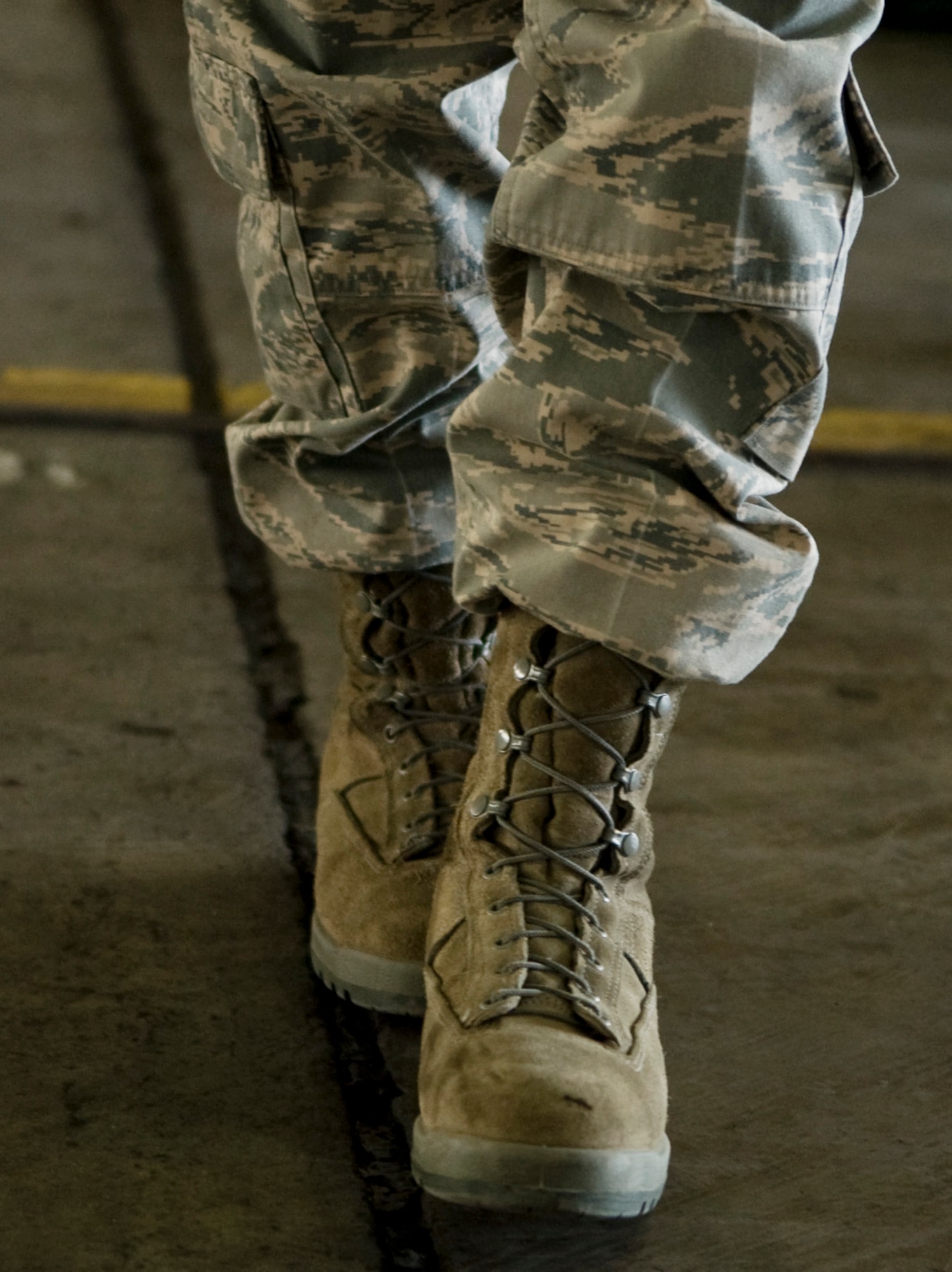 Senior Airman Rachelle Coleman attempts the standard field sobriety test while wearing fatal vision goggles at the annual summer safety fair May 26, 2011, Eielson Air Force Base, Alaska. The goggles cause the wearer a loss of equilibrium, simulating one of the many effects of intoxication.  Airman Coleman is a journalist assigned to the 354th Public Affairs office. (U.S. Air Force photo/Airman 1st Class Laura Goodgame) 