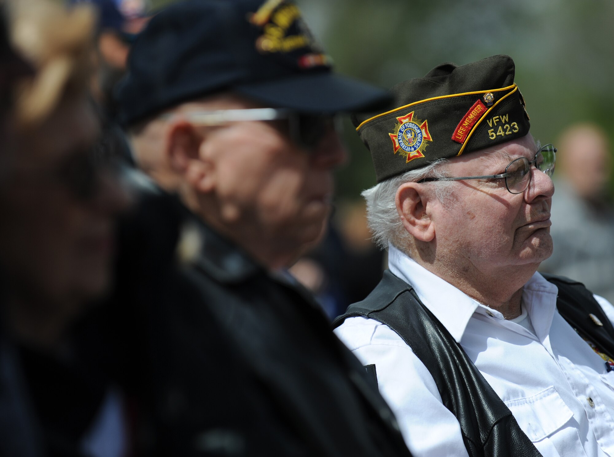 MOUNTAIN HOME, Idaho – Veterans from numerous wars listen as Col. Ron Buckley, 366th Fighter Wing Commander, speaks about heroes past and present at a Memorial Day ceremony at Mountain View Cemetery here May 30. Hundreds of military members and local community members came to honor the fallen. (U.S. Air Force photo by Staff Sgt. Gina Chiaverotti-Paige) 