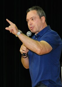 Comedian Bernie McGrenahan delivered a safety message to servicemembers at the Joint Base Andrews Theater here May 26. His message centered on his own life experiences with alcohol, drugs and suicide, passing his very serious message through comedy. (U.S. Air Force photo/ Staff Sgt. Nichelle Anderson)