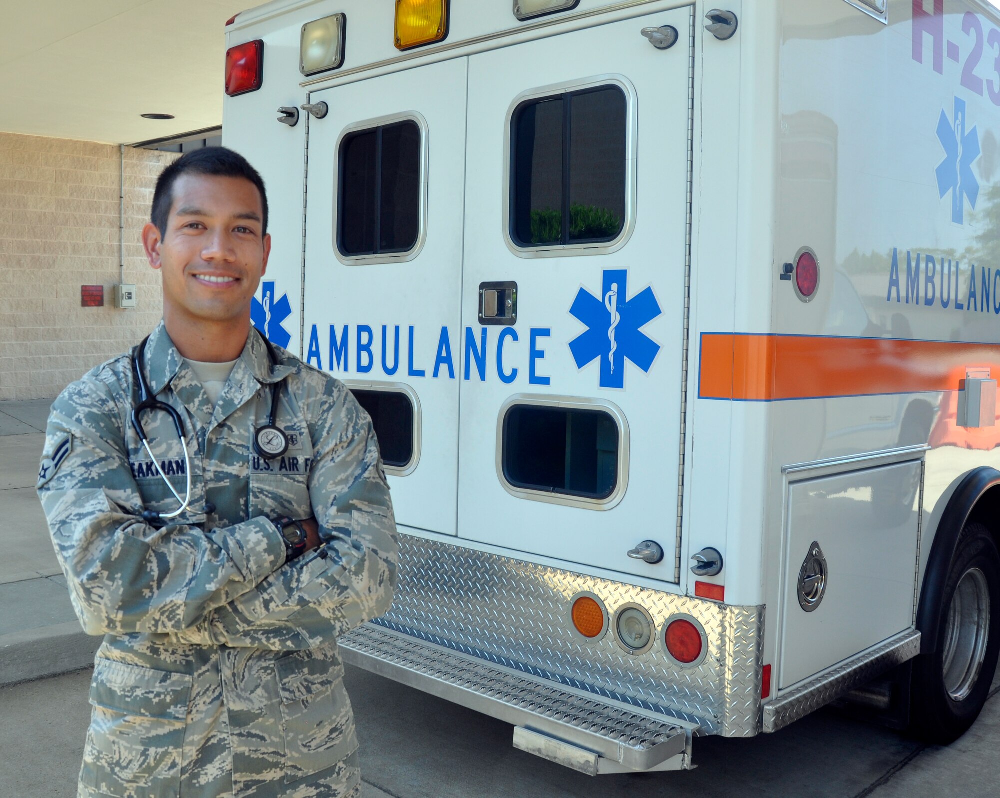 Airman 1st Class Michael Speakman, 1st Special Operations Medical Operations Squadron aerospace medical technician journeyman, poses next to an ambulance outside the clinic at Hurlburt Field, Fla., May 23, 2011. Airman Speakman was selected for this month's Tip of the Spear spotlight. (U.S. Air Force photo by Senior Airman Joe McFadden / RELEASED)