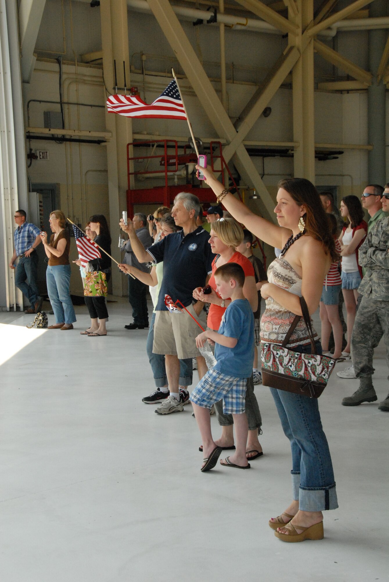 In a Memorial Day sendoff, family members and loved ones gather to bid farewell to members of the 107th Airlift Wing. The Airmen left Niagara Air Reserve Station for their four day journey aboard a C-130 that will eventually land them in Afghanistan for the start of their 90 day tour of duty. (U.S. Air Force photo/Tech Sgt. Catharine Peretta)