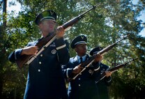 Members of the Moody Air Force Base Honor Guard render a three-volley rifle salute during a Memorial Day ceremony at the Sunset Hill Cemetery in Valdosta, Ga., May 30.  The three-volley rifle salute honored those that gave the ultimate sacrifice. (U.S. Air Force photo/Senior Airman Benjamin Wiseman)(RELEASED)